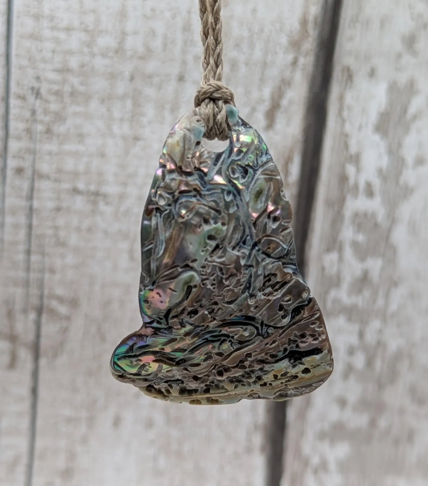 new Zealand Rainbow Pāua naturally tumbled shell pendant