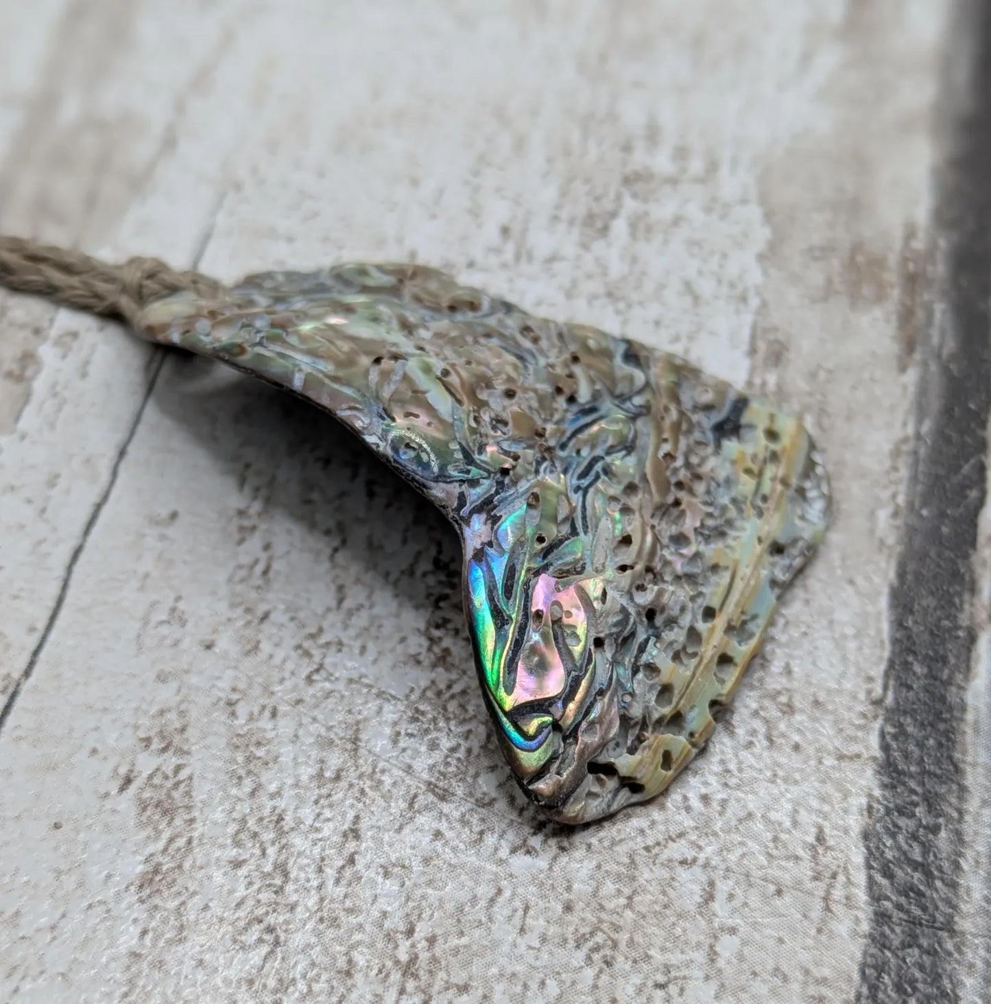 new Zealand Rainbow Pāua naturally tumbled shell pendant