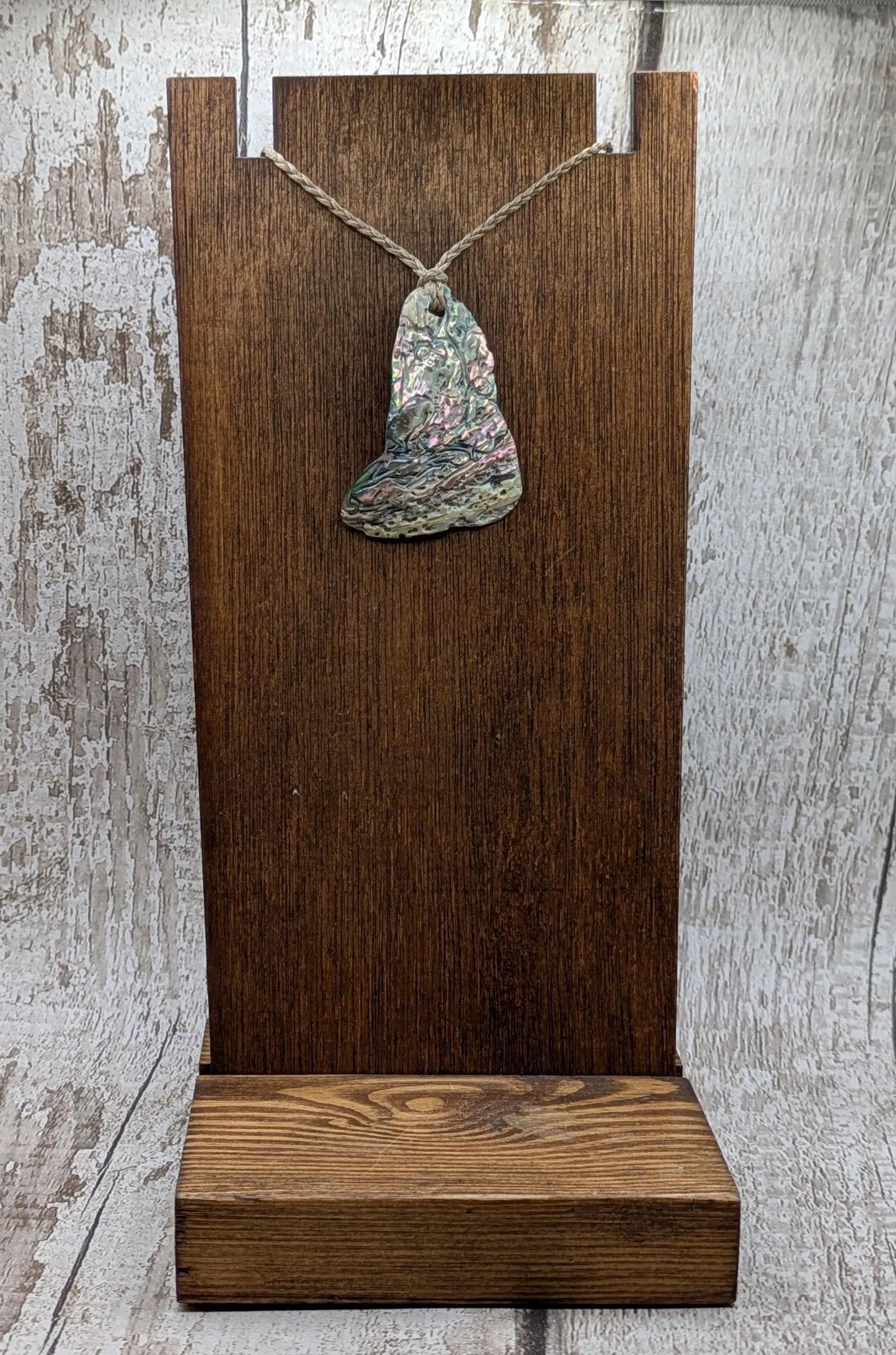 new Zealand Rainbow Pāua naturally tumbled shell pendant