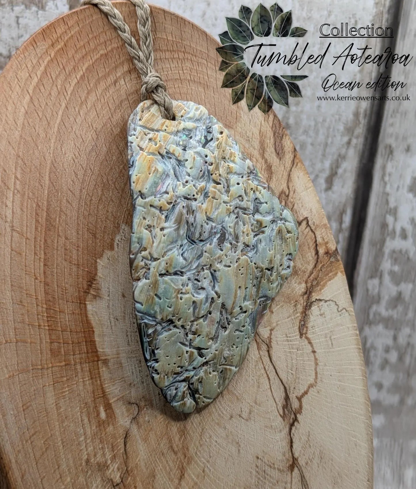 Naturally Tumbled rainbow Pāua abalone shell pendant