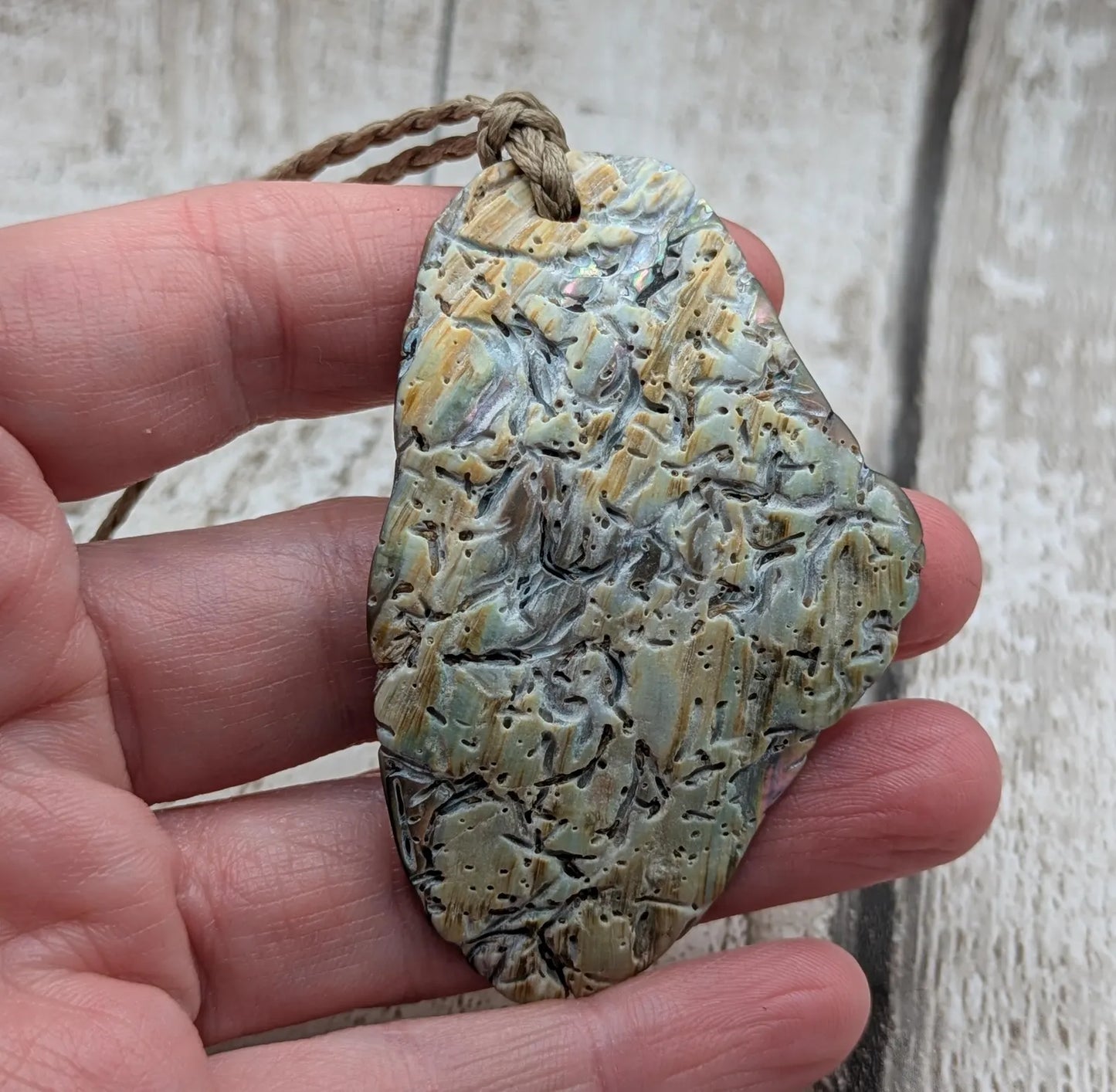 Naturally Tumbled rainbow Pāua abalone shell pendant
