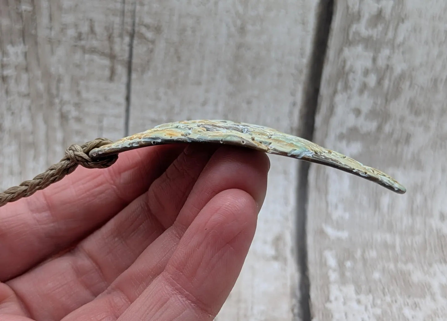Naturally Tumbled rainbow Pāua abalone shell pendant