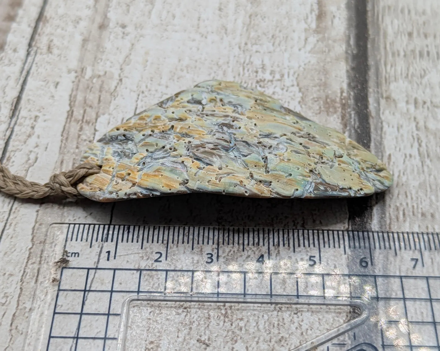 Naturally Tumbled rainbow Pāua abalone shell pendant