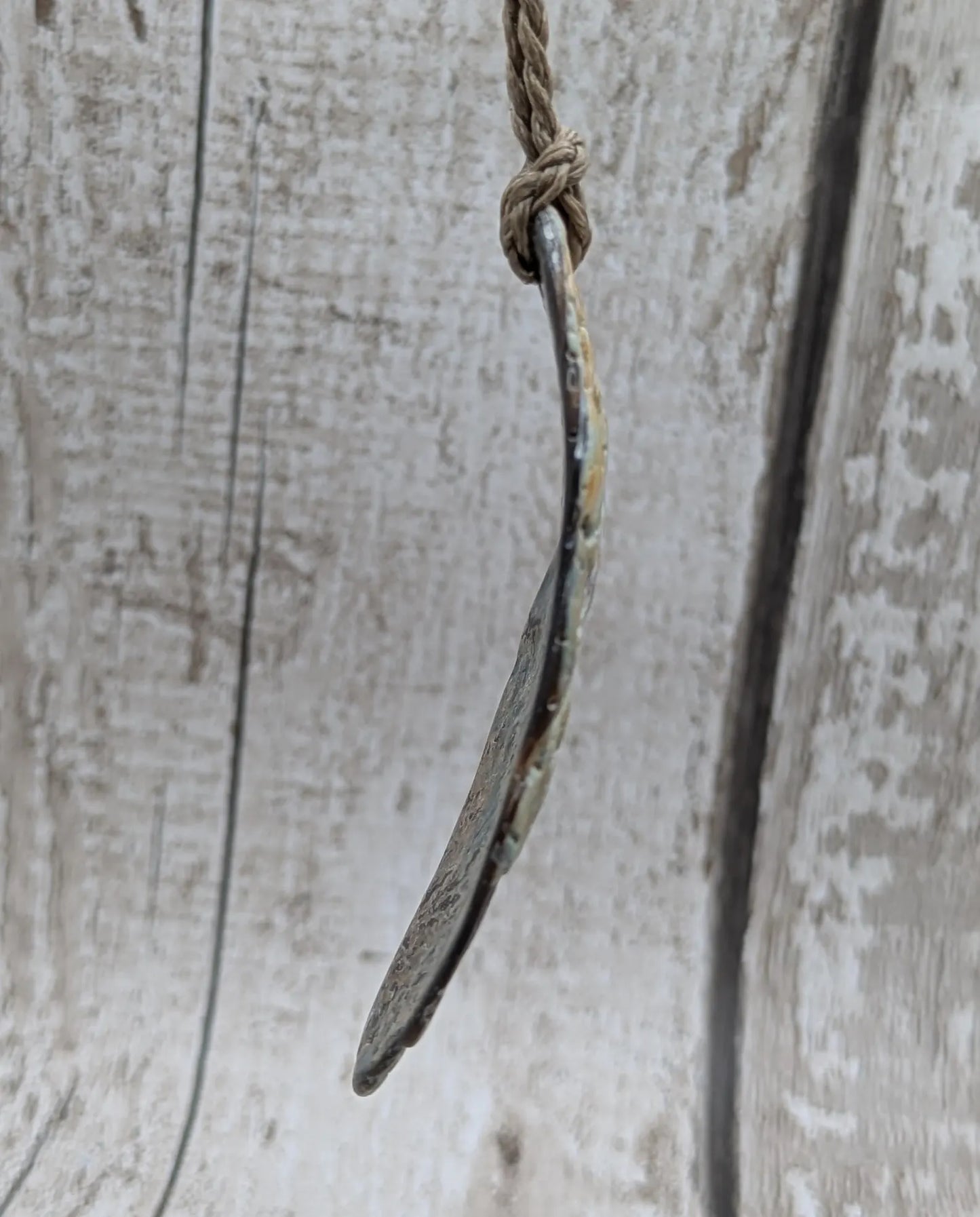 Naturally Tumbled rainbow Pāua abalone shell pendant