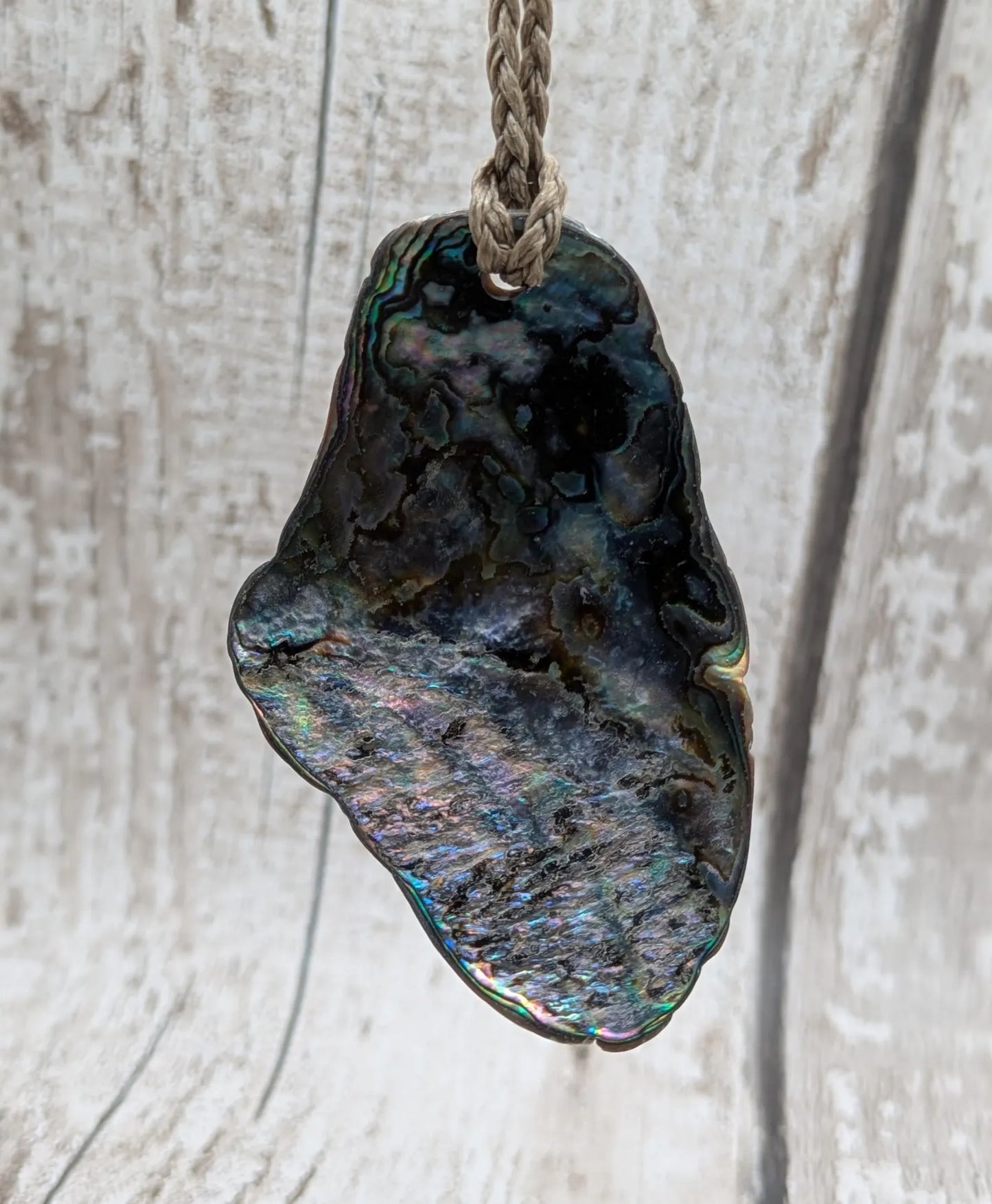 Naturally Tumbled rainbow Pāua abalone shell pendant