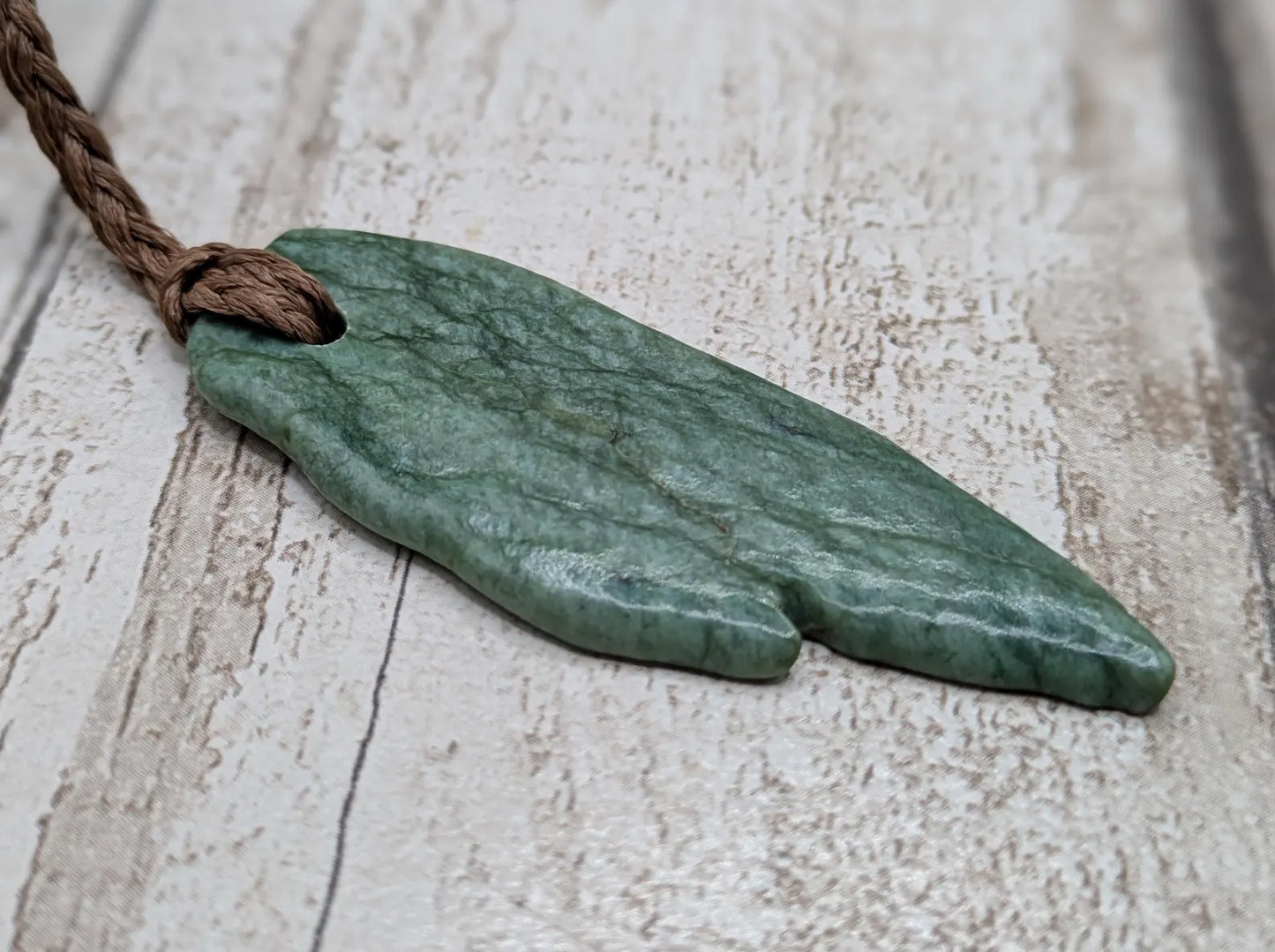Tumbled Pounamu New Zealand greenstone pounamu pendant.