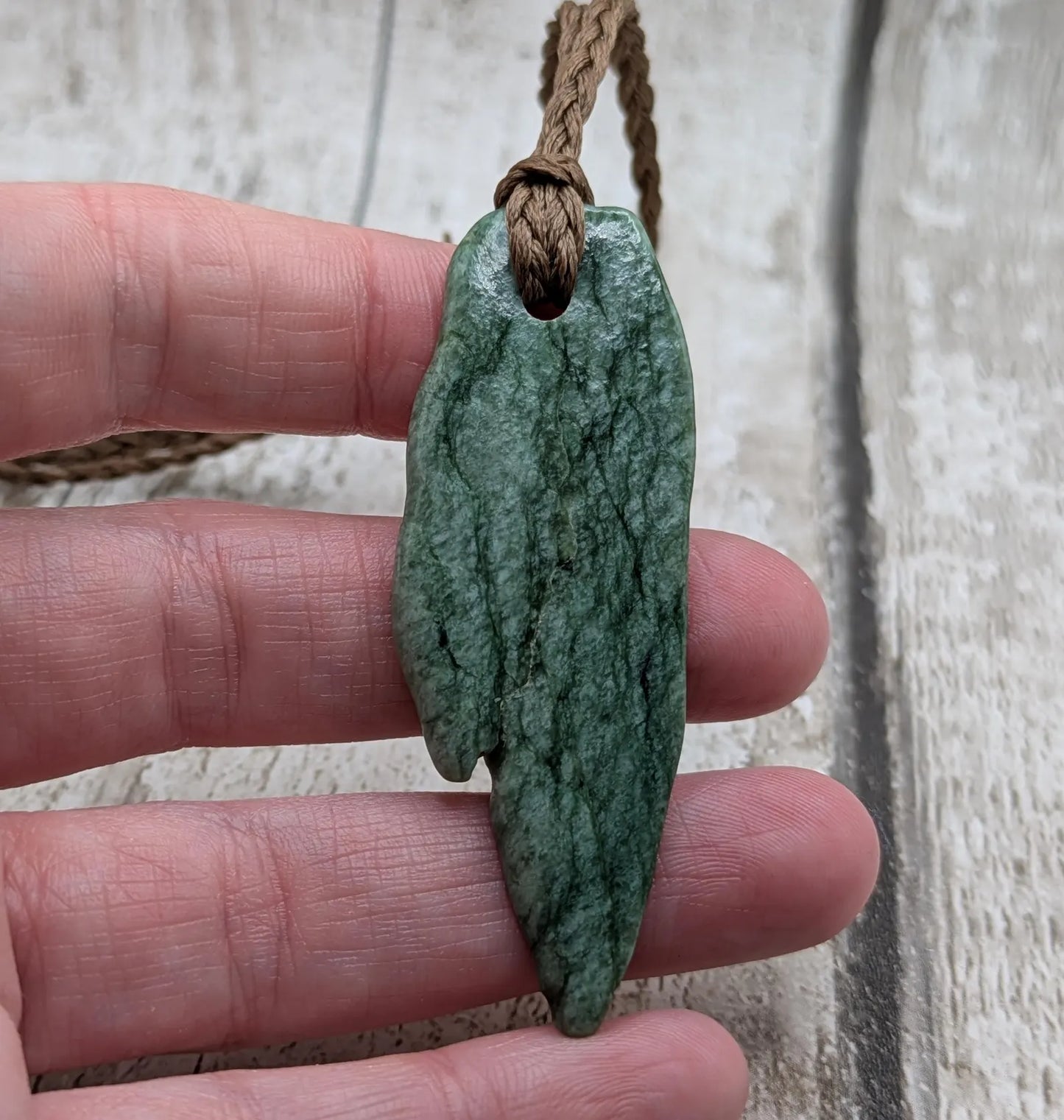 Tumbled Pounamu New Zealand greenstone pounamu pendant.