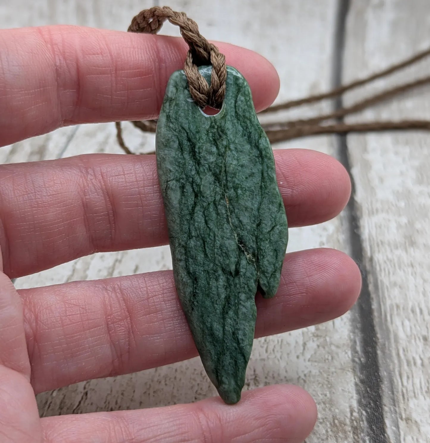 Tumbled Pounamu New Zealand greenstone pounamu pendant.