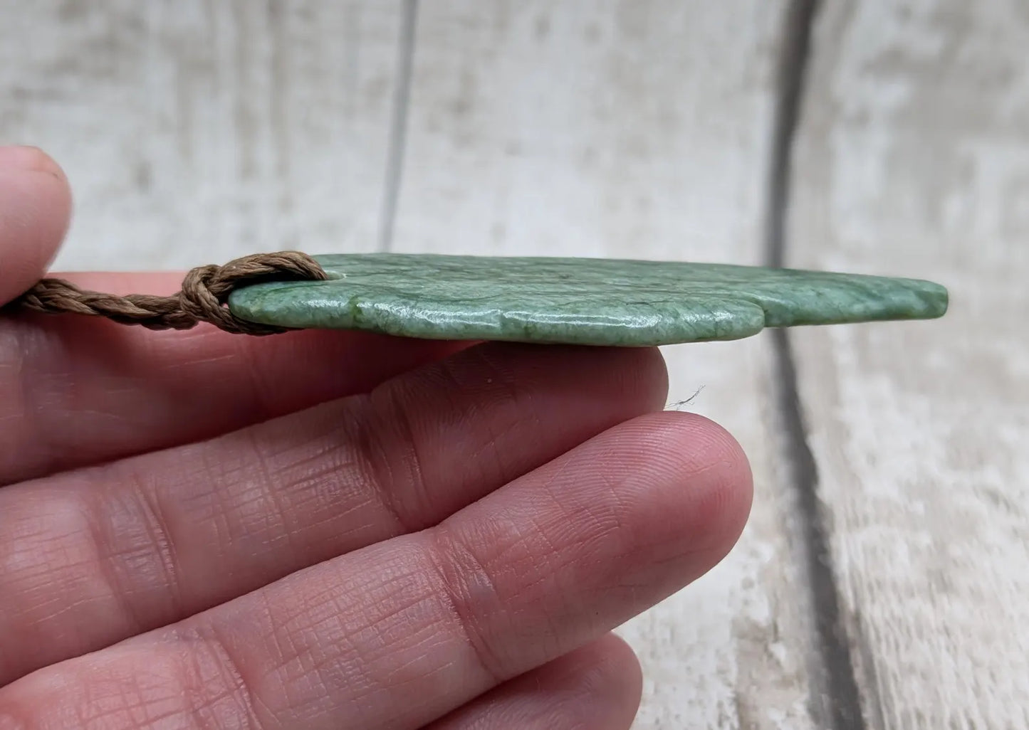 Tumbled Pounamu New Zealand greenstone pounamu pendant.