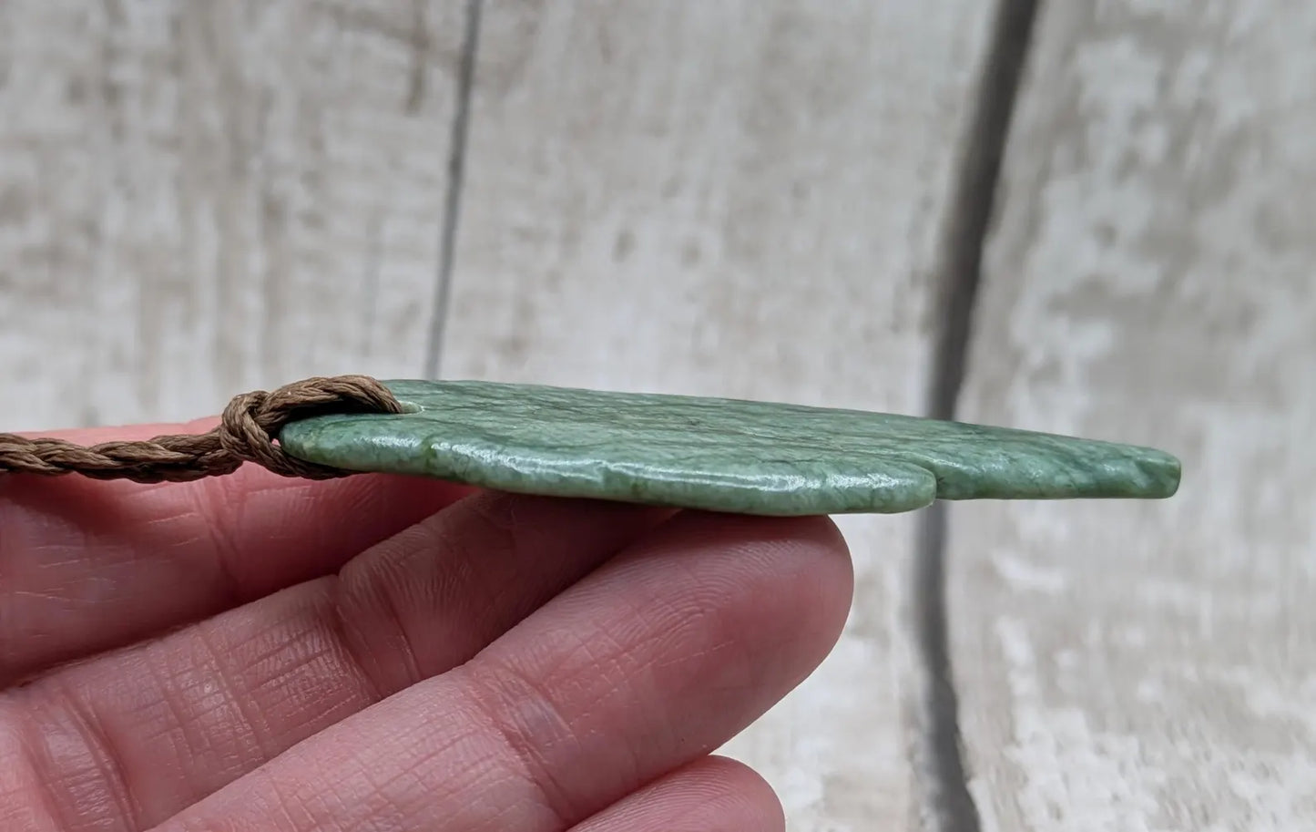 Tumbled Pounamu New Zealand greenstone pounamu pendant.