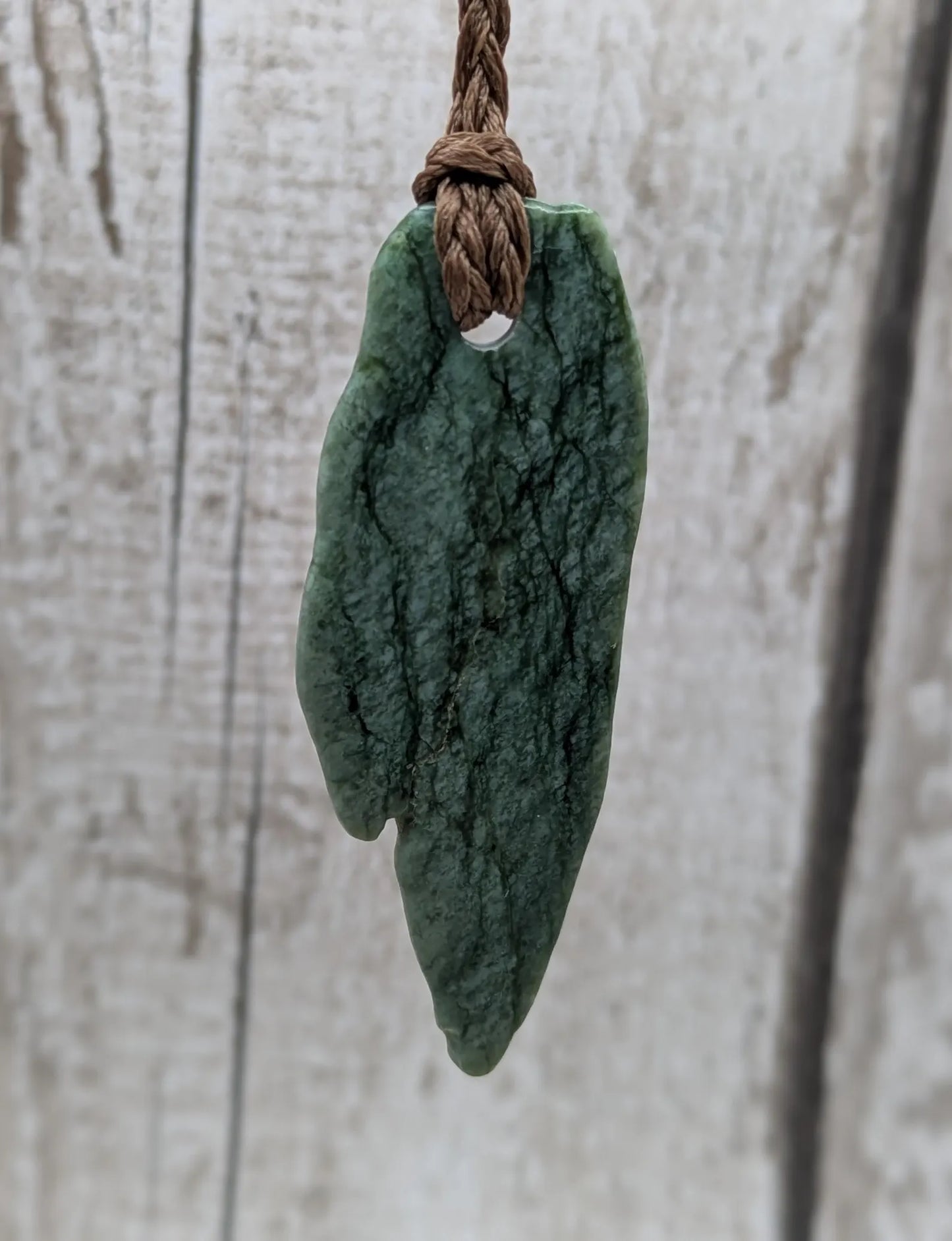 Tumbled Pounamu New Zealand greenstone pounamu pendant.