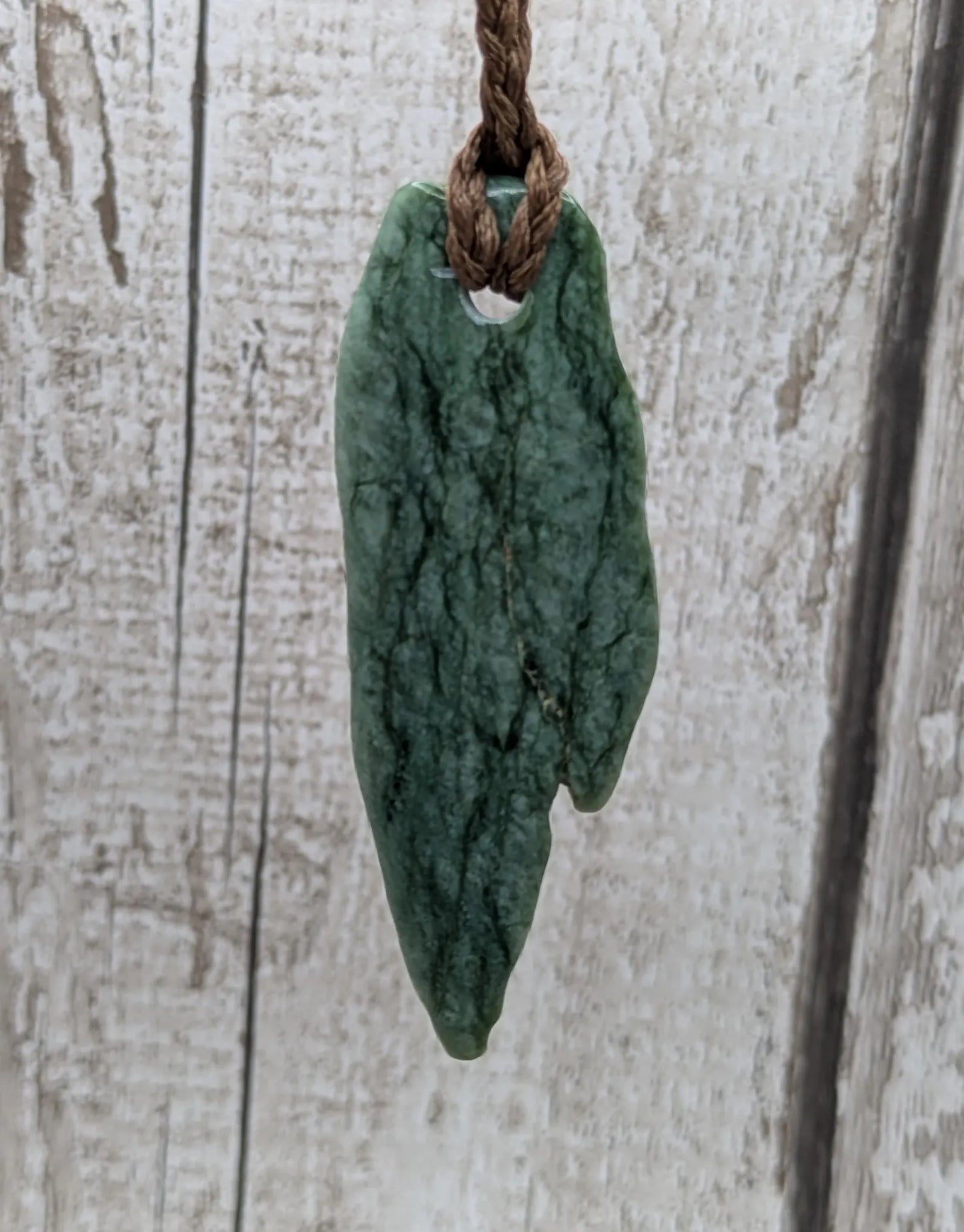 Tumbled Pounamu New Zealand greenstone pounamu pendant.