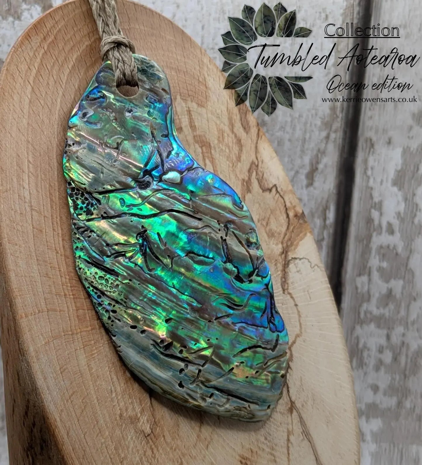 New Zealand free form naturally tumbled Pāua shell pendant.