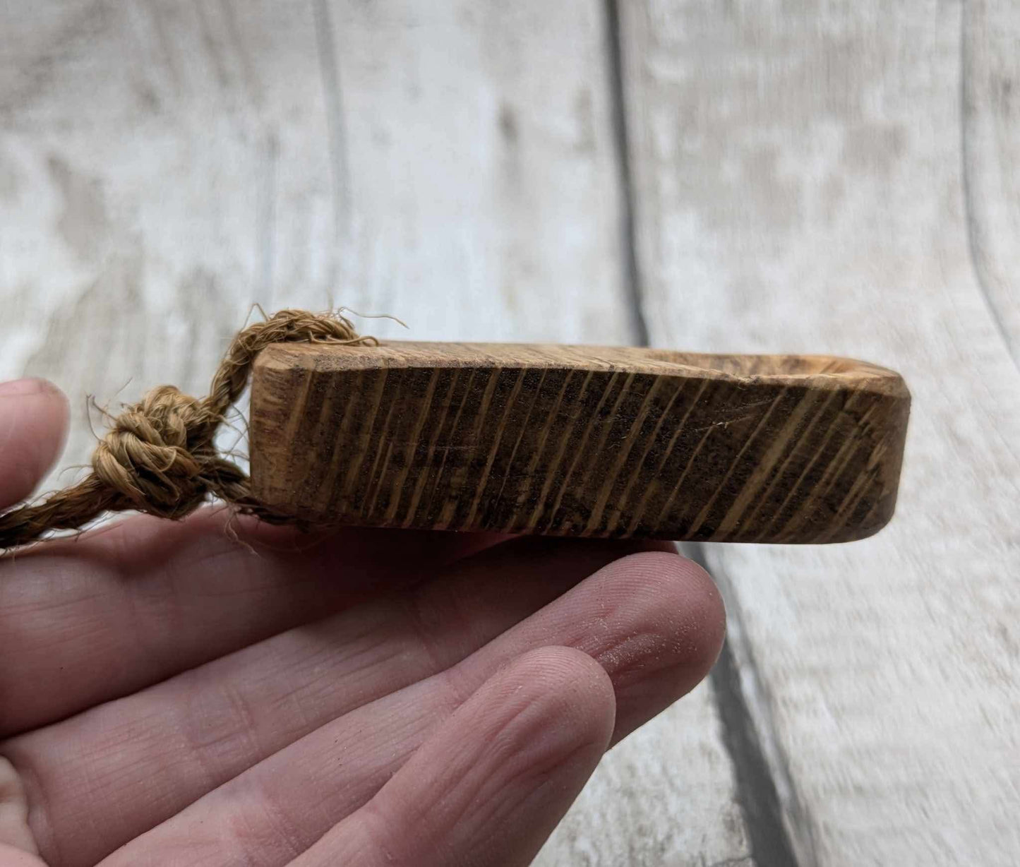 Olive wood travel sized incense holder.