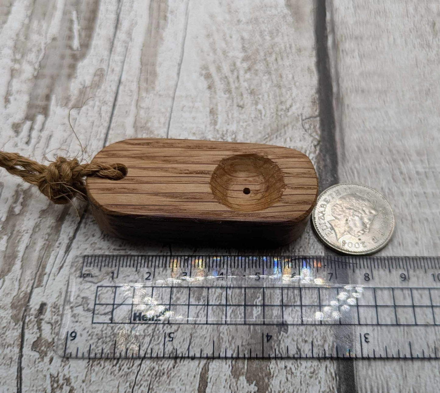 Olive wood travel sized incense holder.