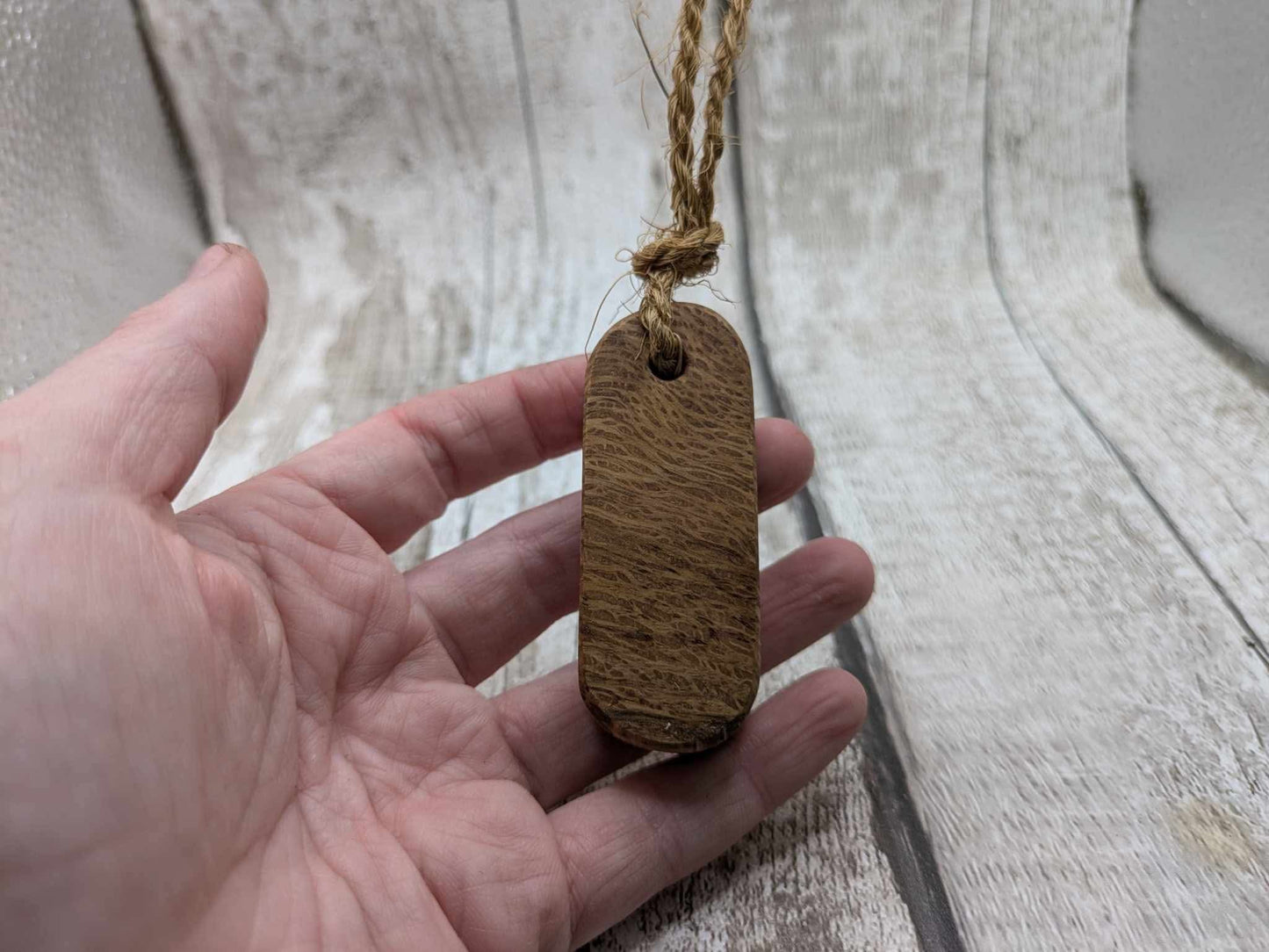 Olive wood travel sized incense holder.