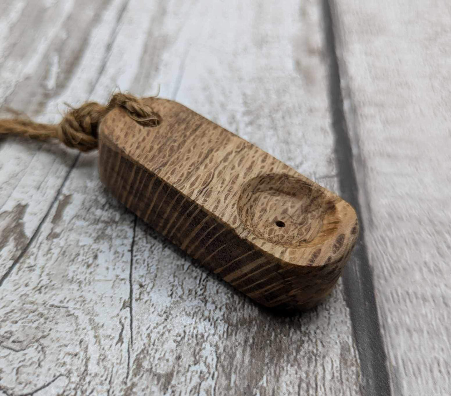 Olive wood travel sized incense holder.
