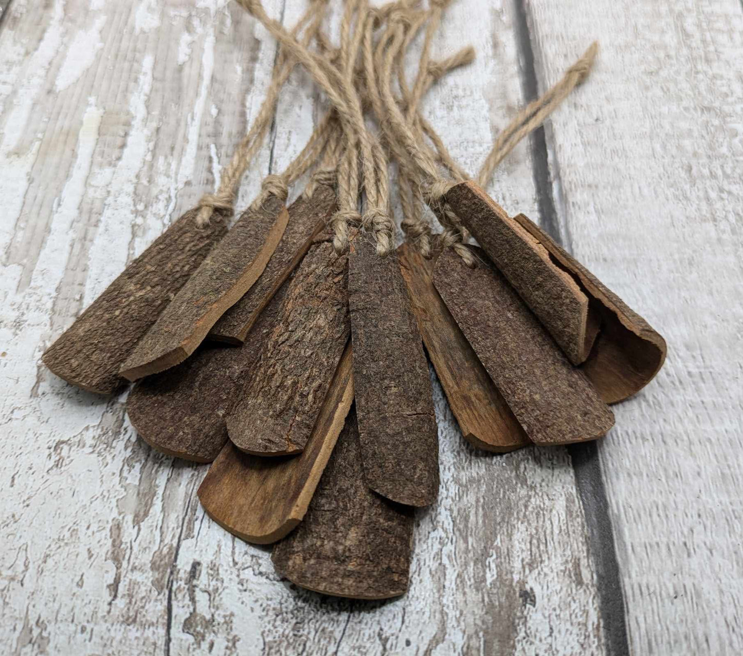 Plain Cinnamon bark shaped Christmas decorations.