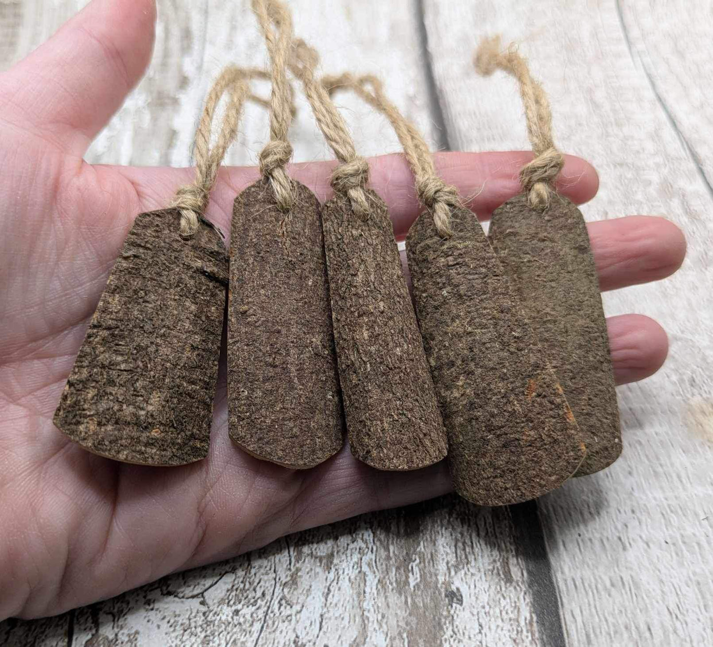 Plain Cinnamon bark shaped Christmas decorations.