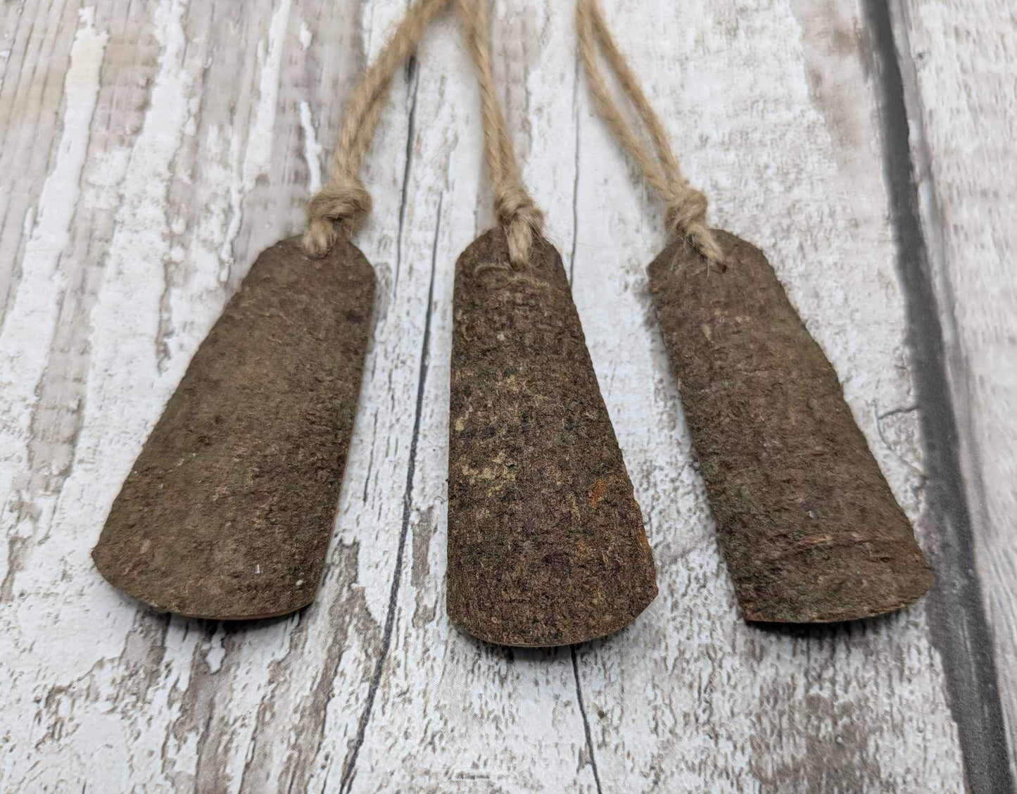 Plain Cinnamon bark shaped Christmas decorations.