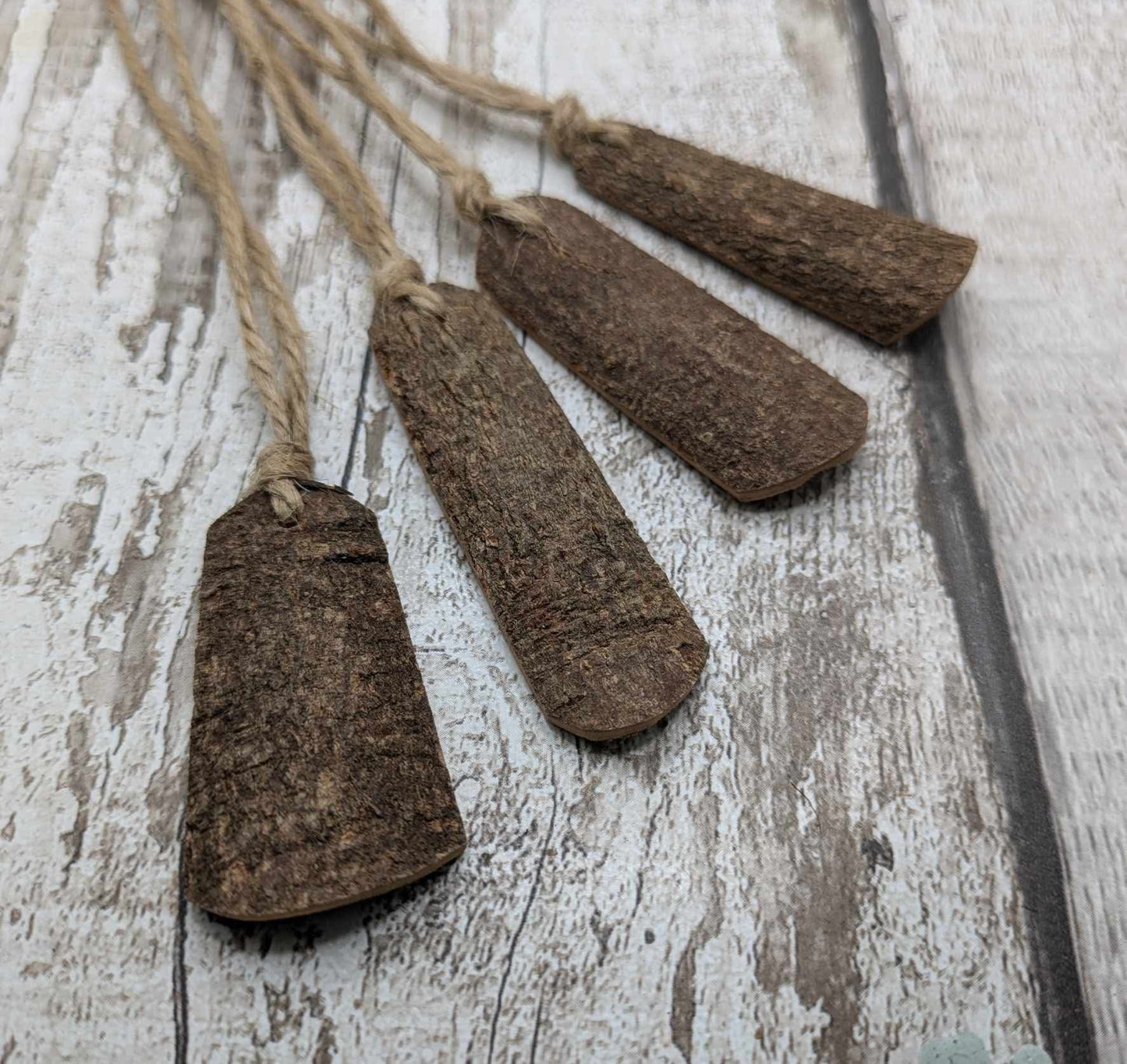 Plain Cinnamon bark shaped Christmas decorations.