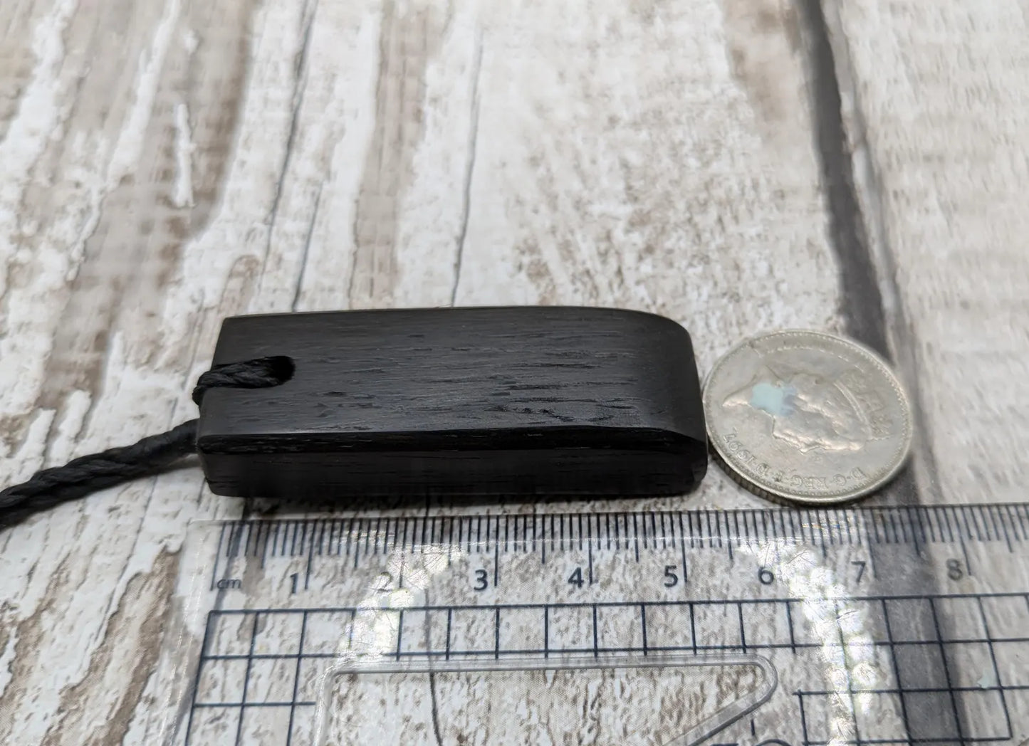 Fenland bog oak Toki adze style pendant with morganite and moldavite.