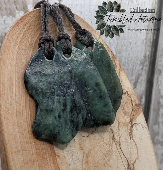 Large tumble Polished new Zealand pounamu greenstone jade pendant.