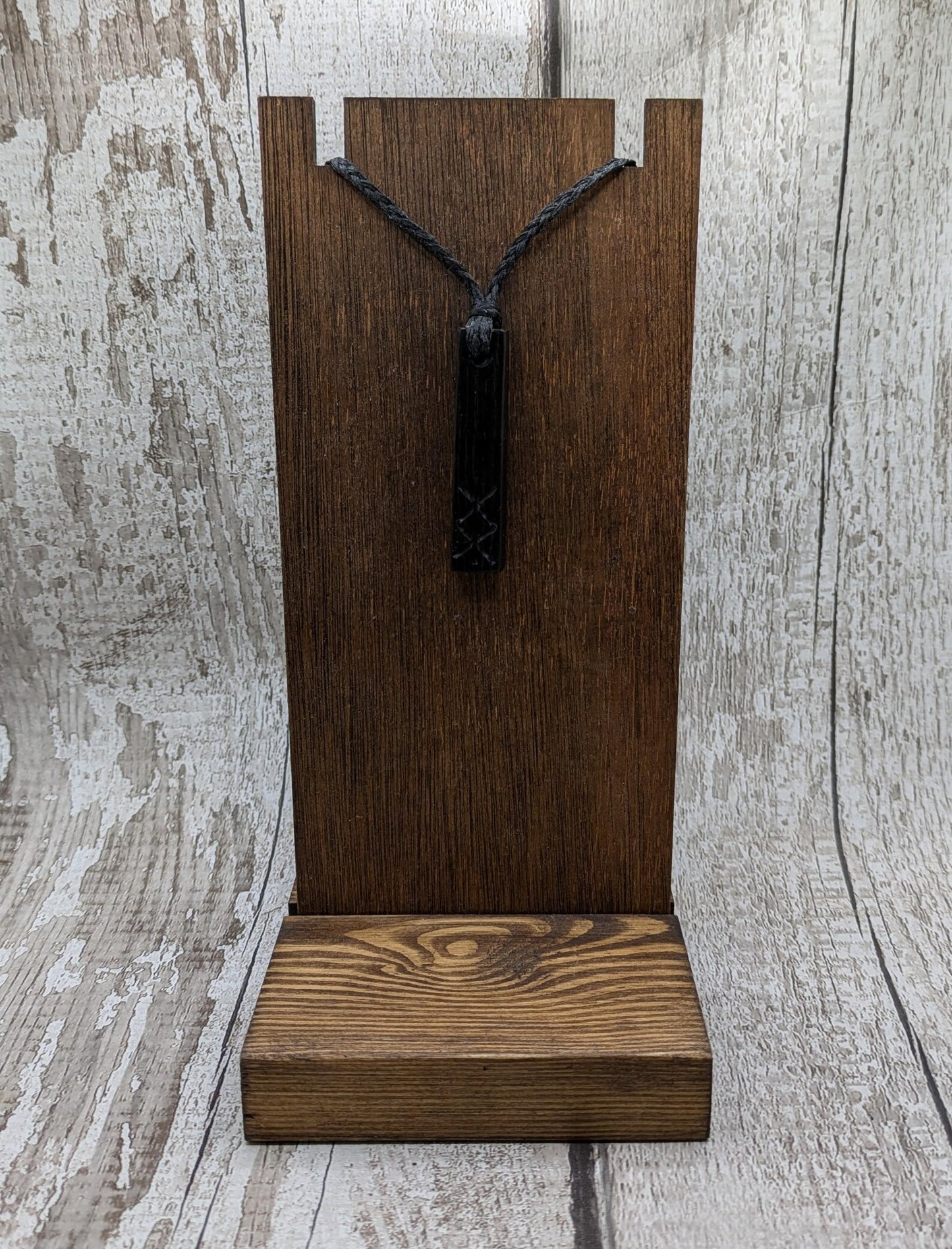 Fenland bog oak with protection bind rune pendant.