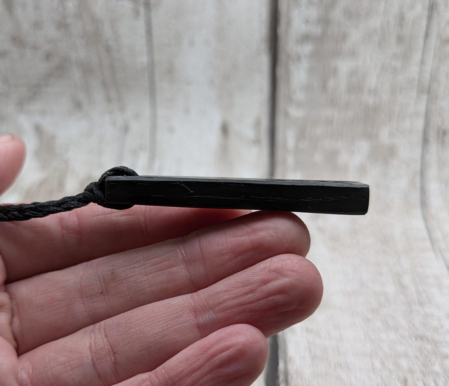 Fenland bog oak with protection bind rune pendant.