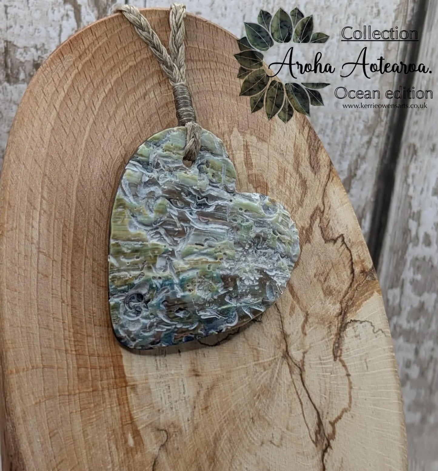 New Zealand rainbow Pāua abalone heart shaped pendant.
