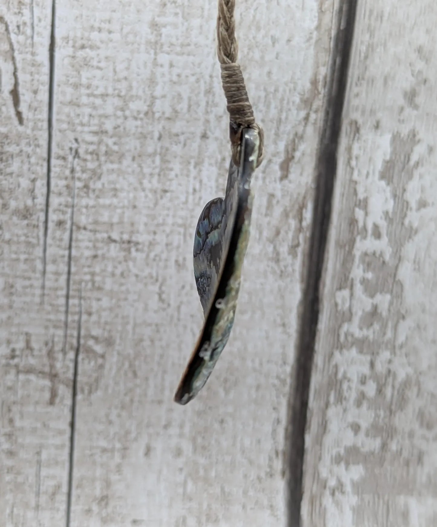 New Zealand rainbow Pāua abalone heart shaped pendant.