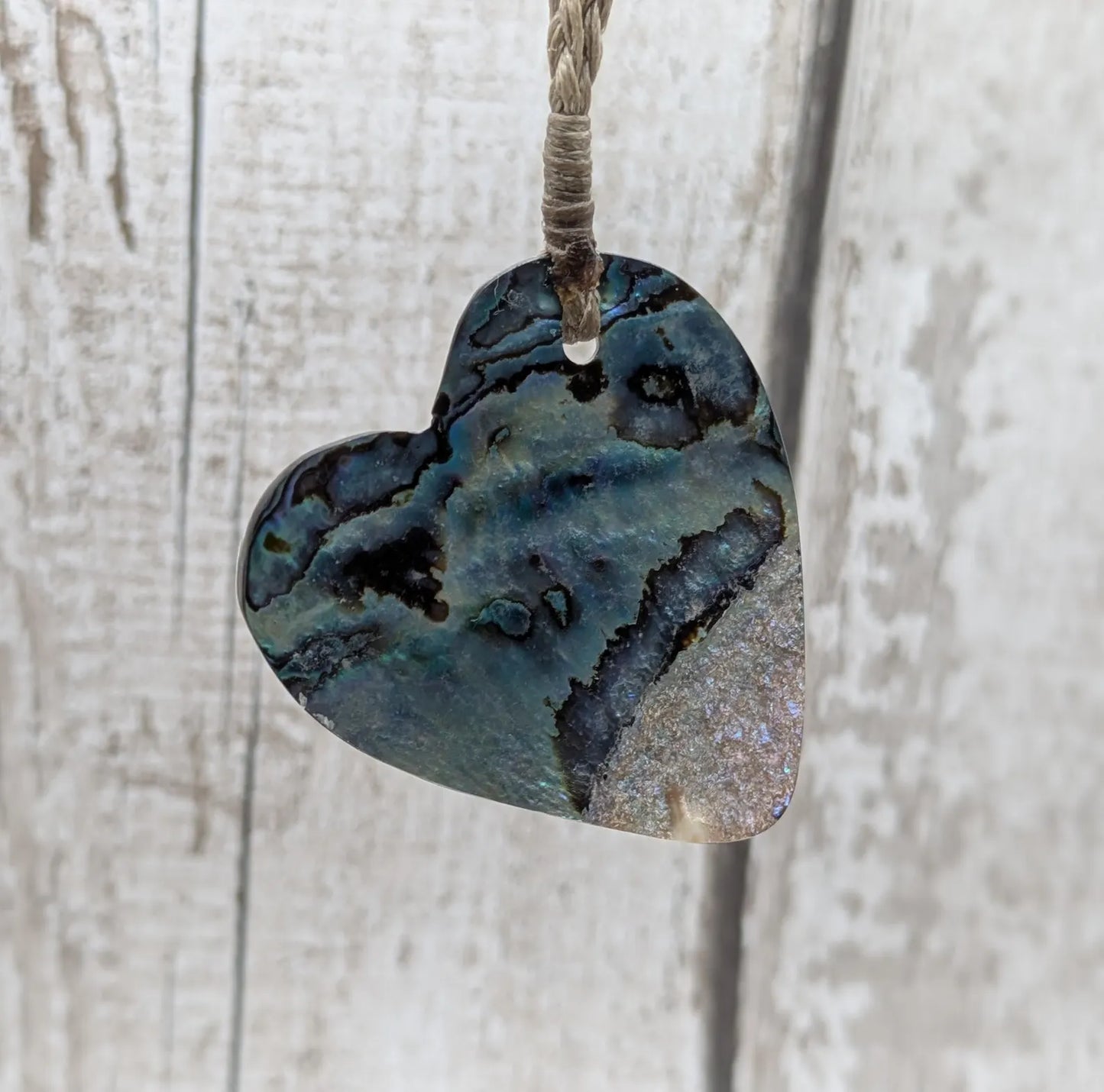 New Zealand rainbow Pāua abalone heart shaped pendant.