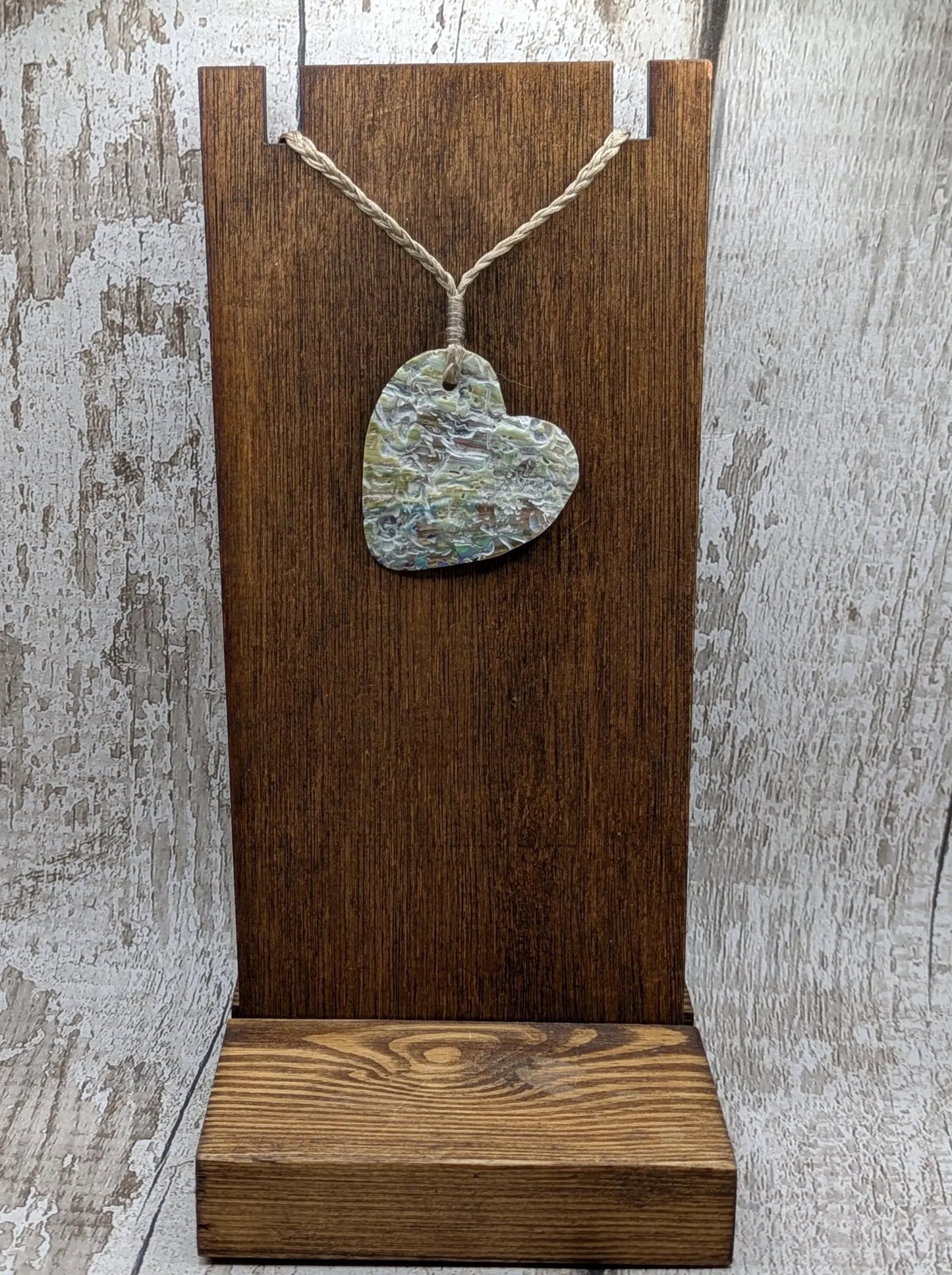New Zealand rainbow Pāua abalone heart shaped pendant.