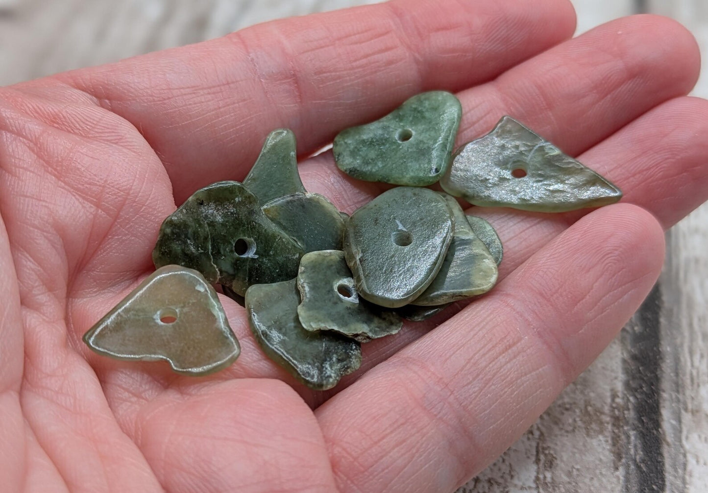 10 top drilled Pounamu greenstone jade beads.