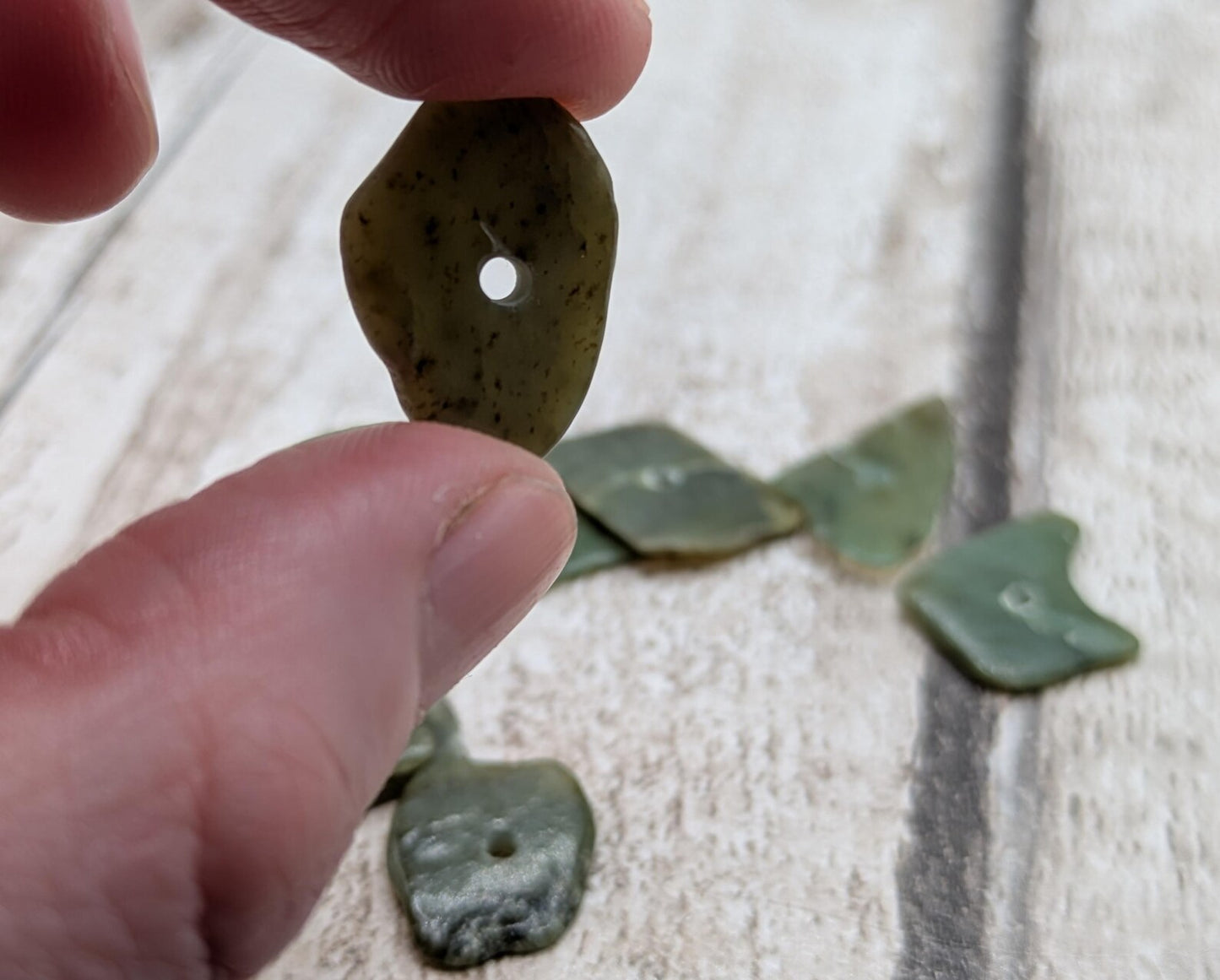 10 top drilled Pounamu greenstone jade beads.
