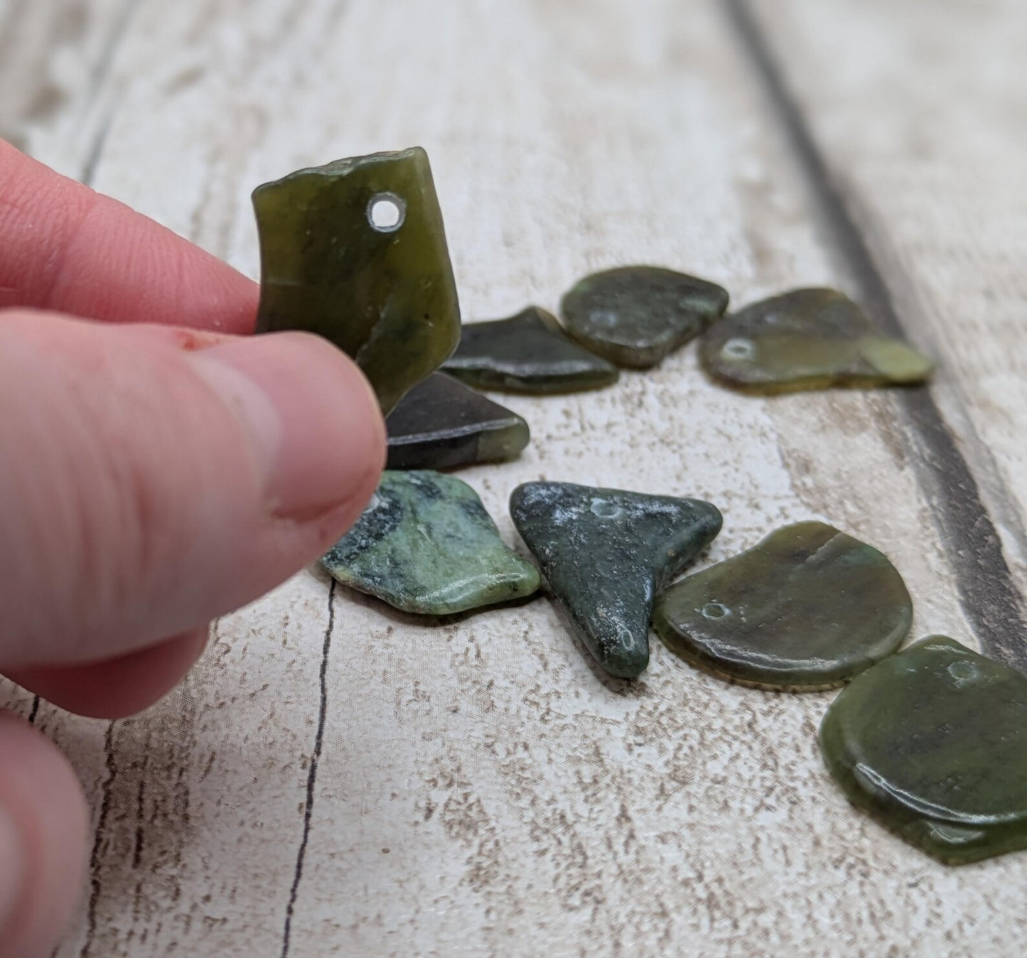 10 Pounamu greenstone jade beads.