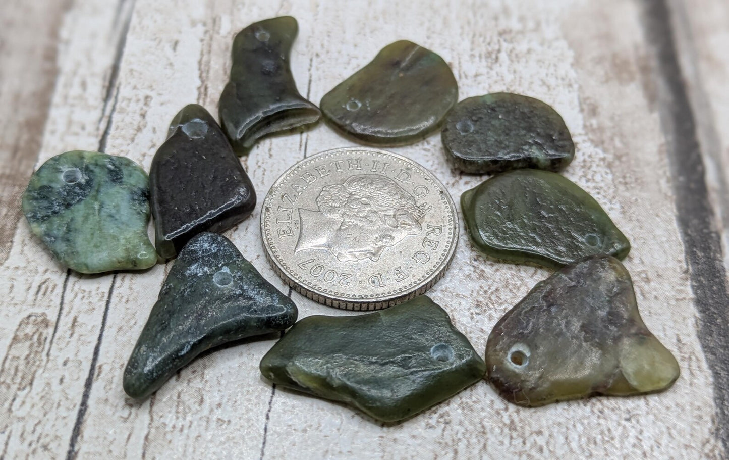 10 Pounamu greenstone jade beads.
