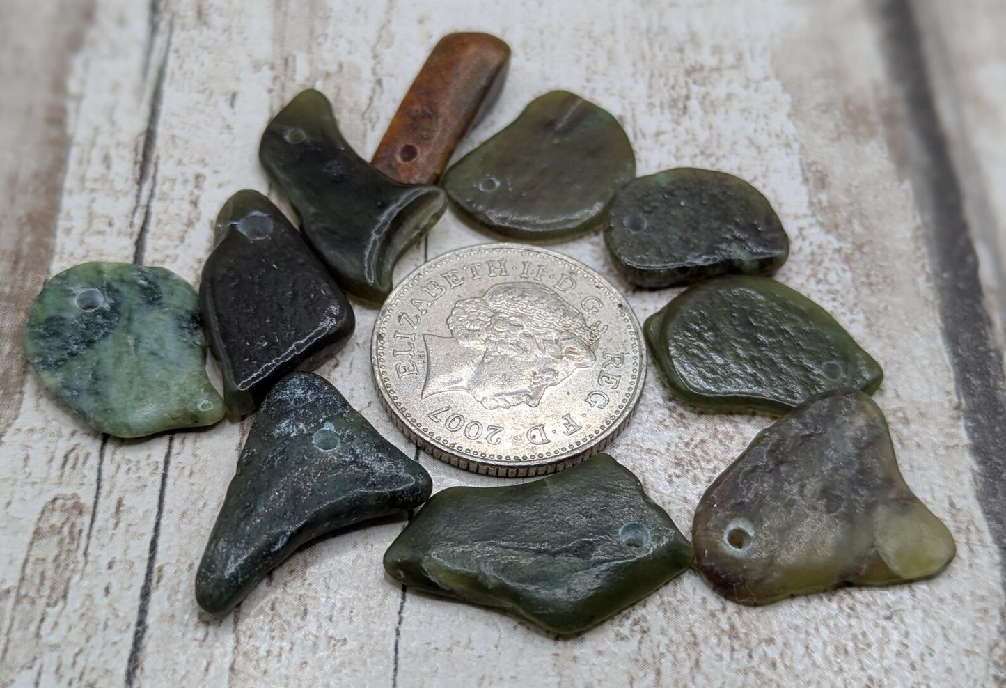 10 Pounamu greenstone jade beads.