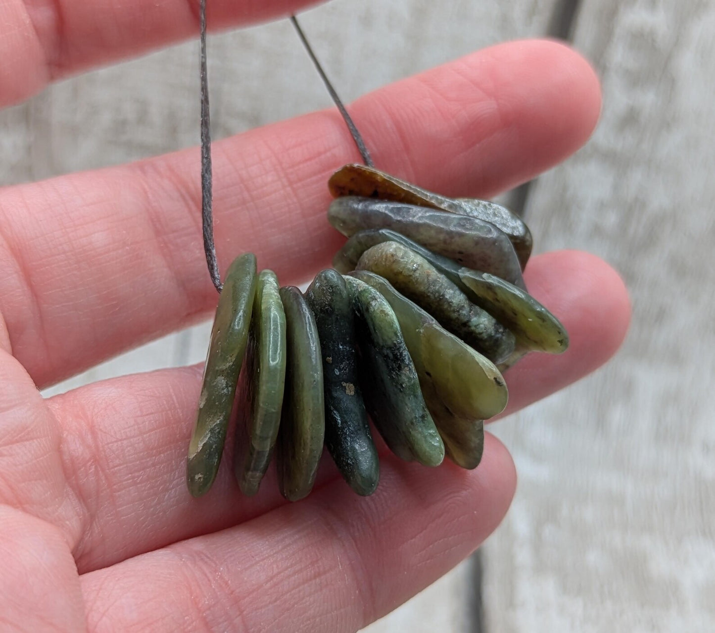 10 Pounamu greenstone jade beads.