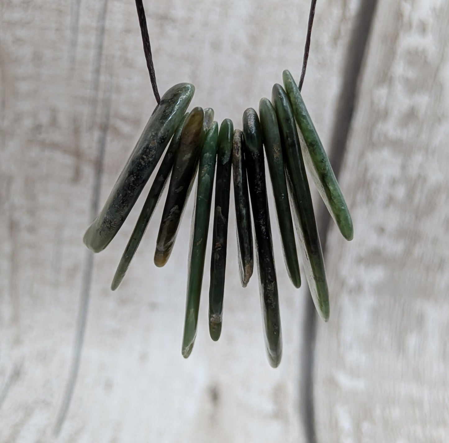 10 top drilled Pounamu greenstone jade beads.