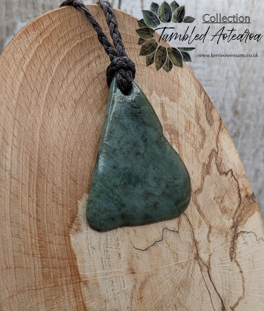 NZ Pounamu greenstone jade tumbled pendant.