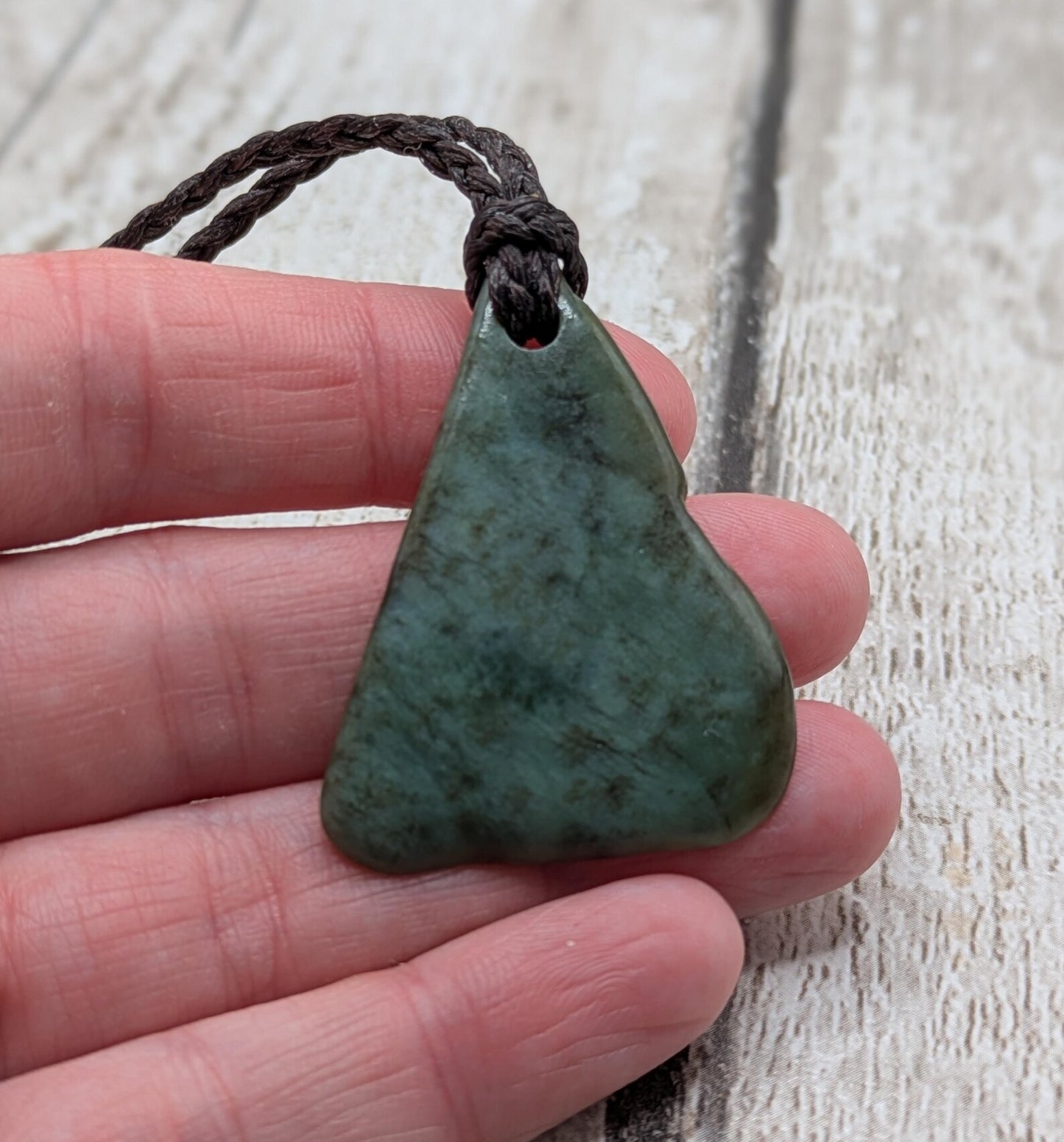 NZ Pounamu greenstone jade tumbled pendant.