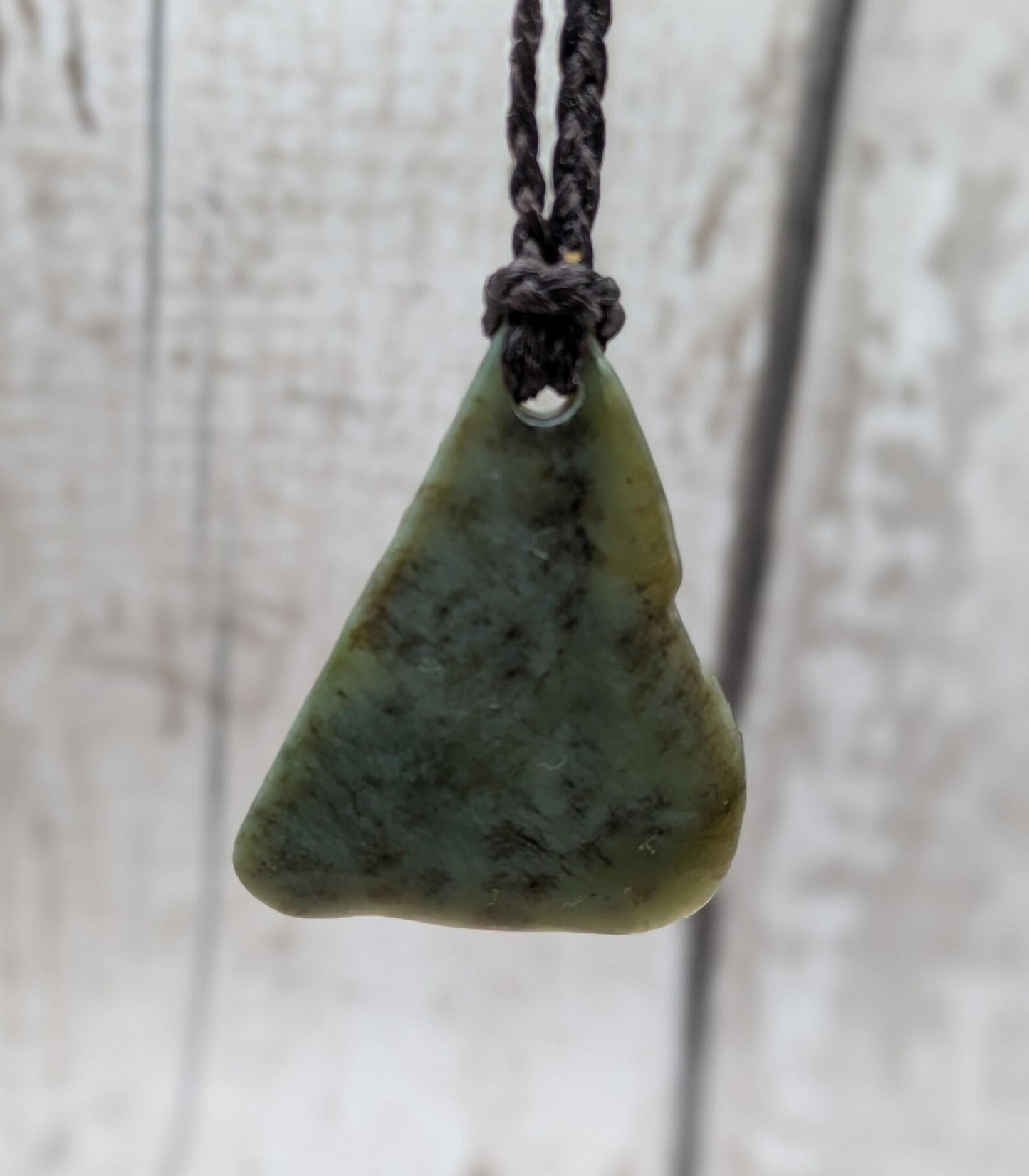 NZ Pounamu greenstone jade tumbled pendant.