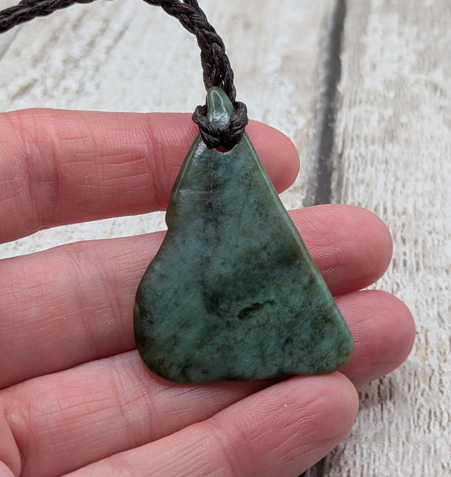 NZ Pounamu greenstone jade tumbled pendant.