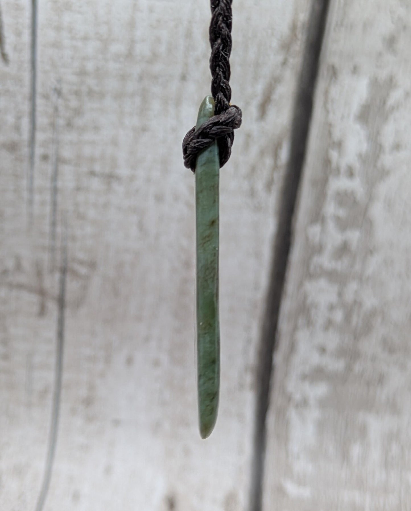 NZ Pounamu greenstone jade tumbled pendant.