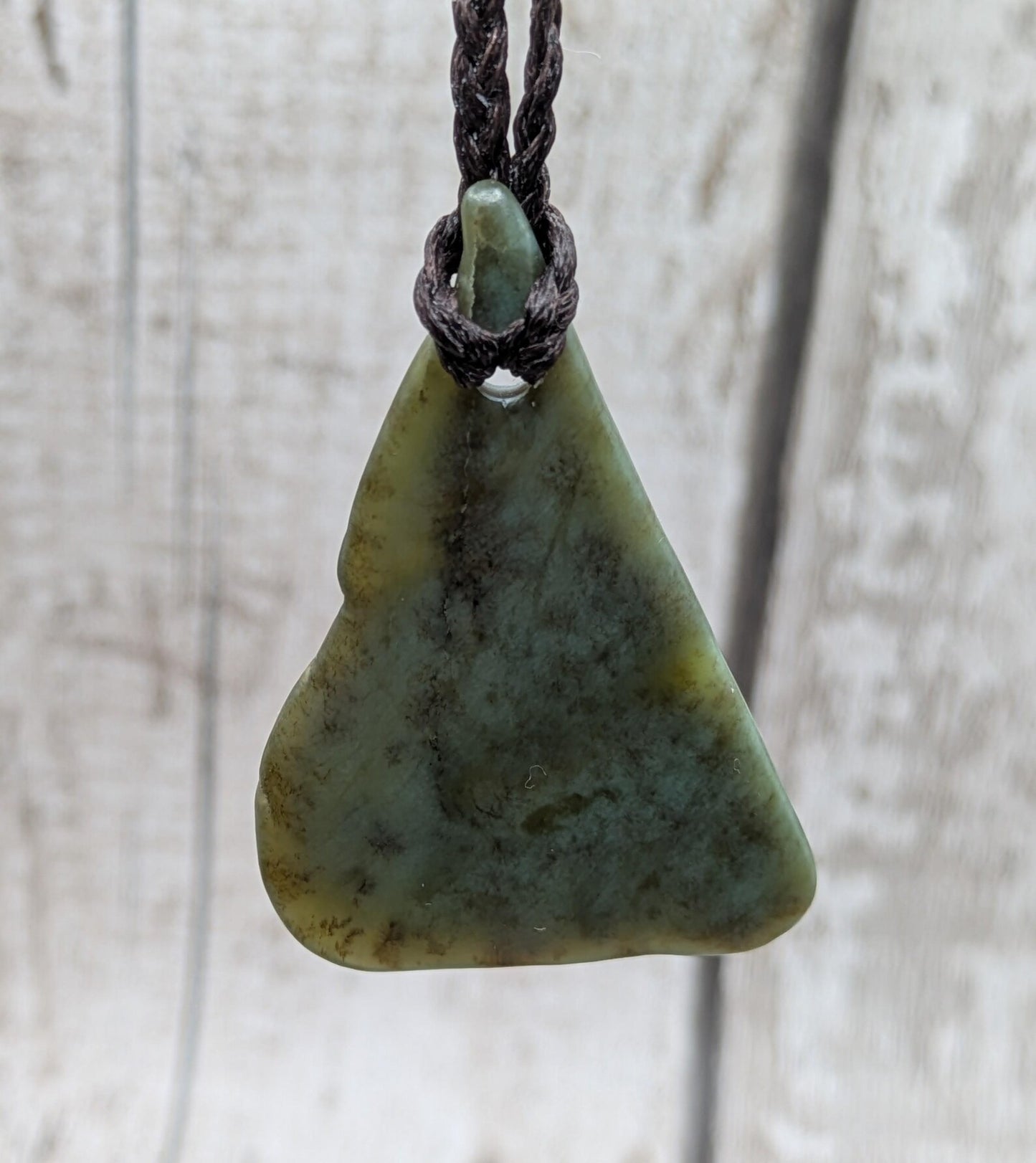 NZ Pounamu greenstone jade tumbled pendant.