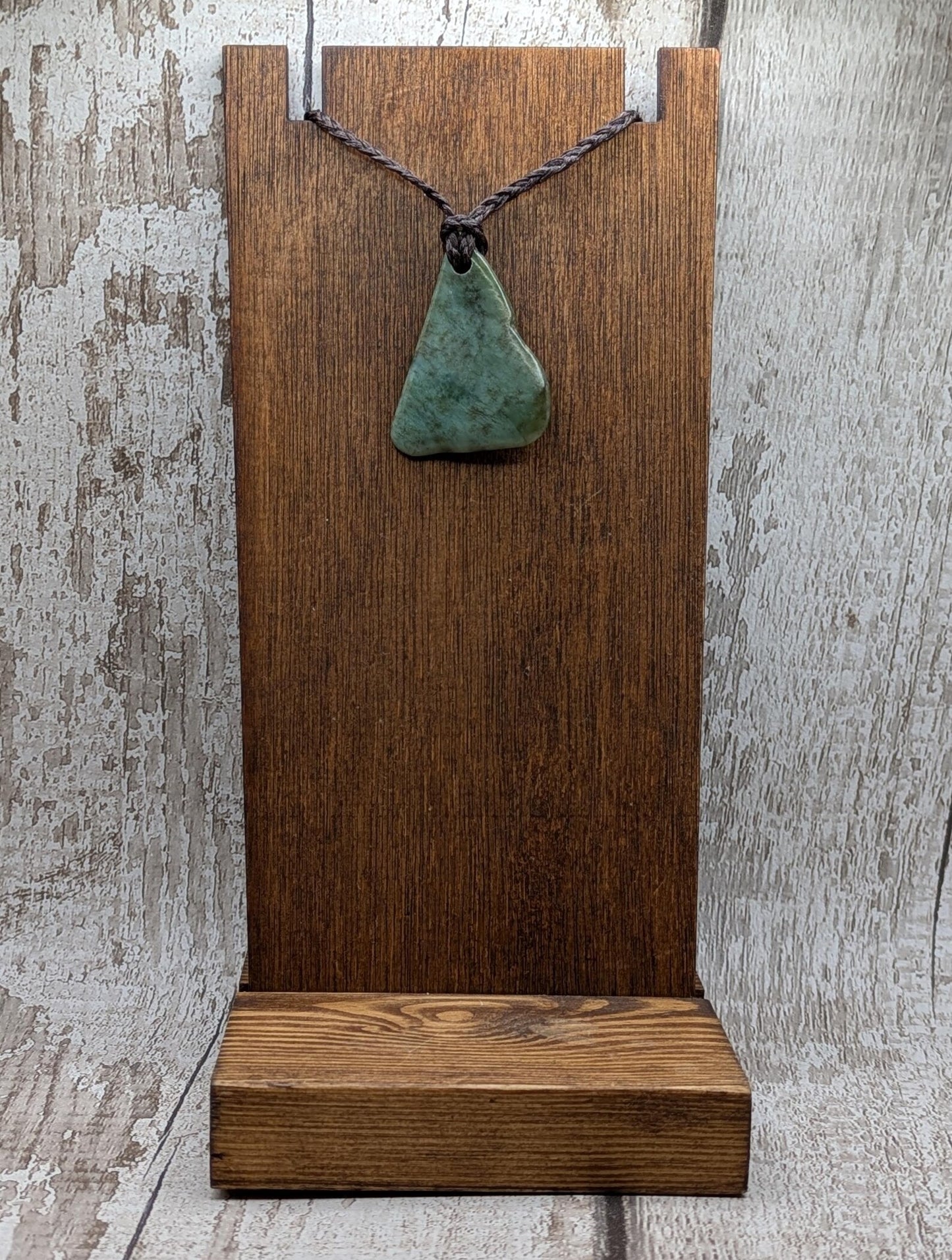 NZ Pounamu greenstone jade tumbled pendant.