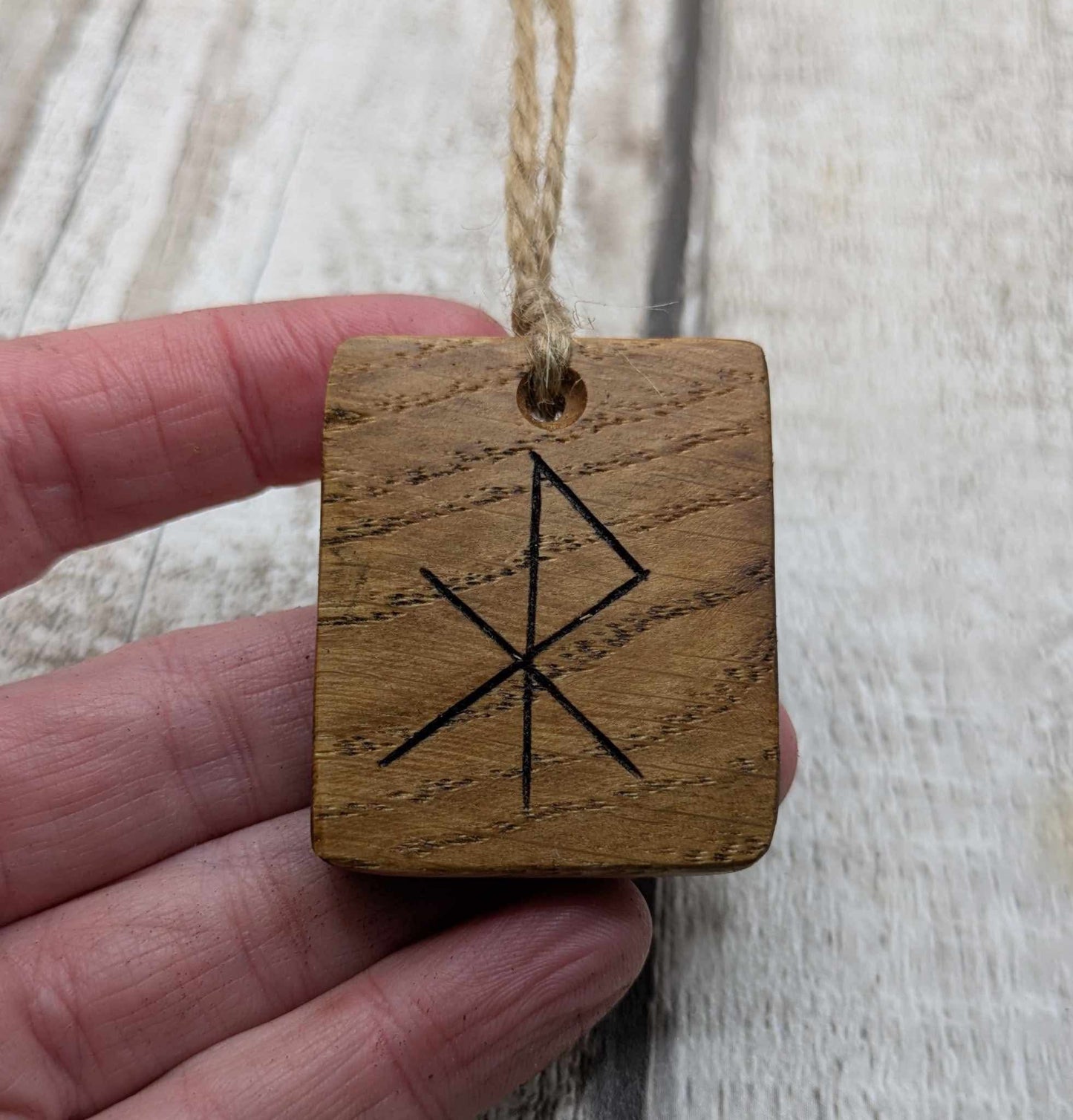 Oak wood courage bind rune hanging decoration.