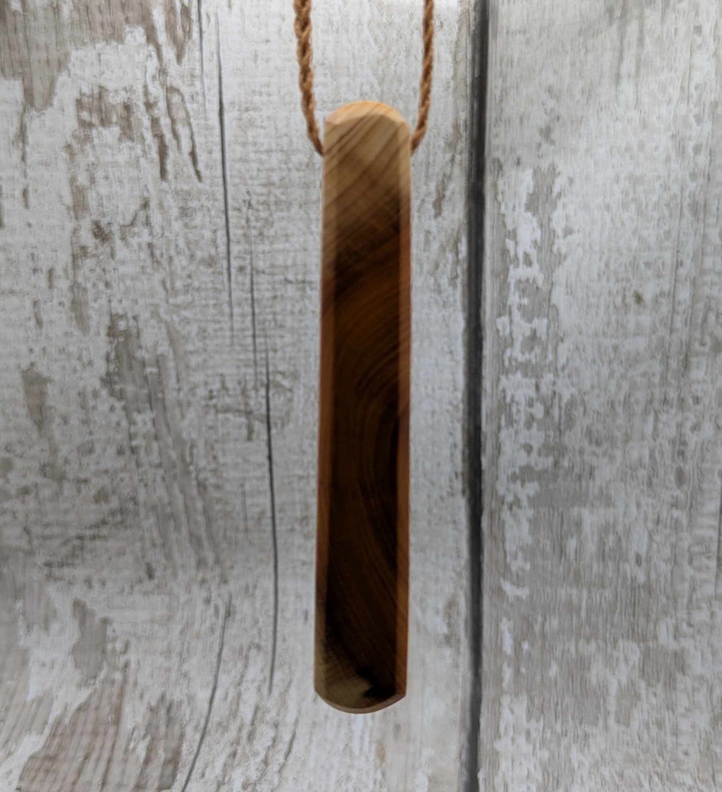 Yew wood roimata pendant.