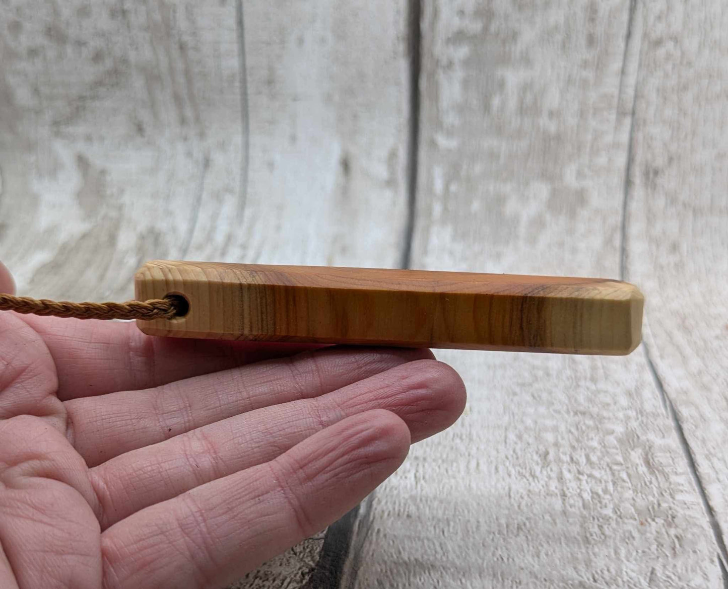 Yew wood roimata pendant.